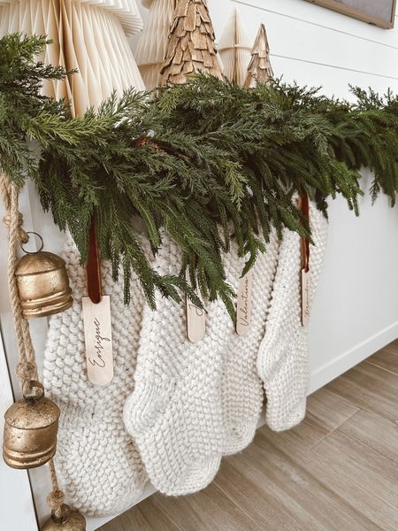 Stocking tags 🏷️ #personalizedstockingtags #gifttags #stockings #mantel #garland #goldbells #christmasdecor 

#LTKunder50 #LTKHoliday #LTKhome