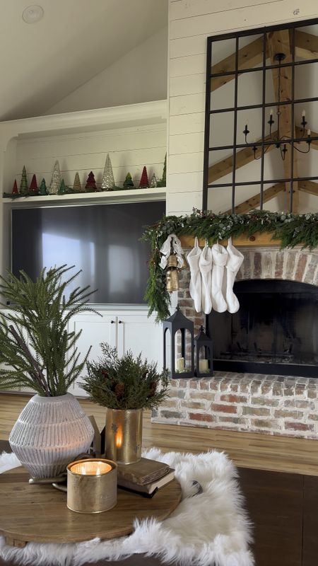 Christmas living room, Kirkland’s, farmhouse Christmas, garland, floor mirror, fireplace mantle, amazon, bells, black lanterns, Mercury trees, greenery, stems, stockings, 

#LTKSeasonal #LTKHoliday #LTKhome