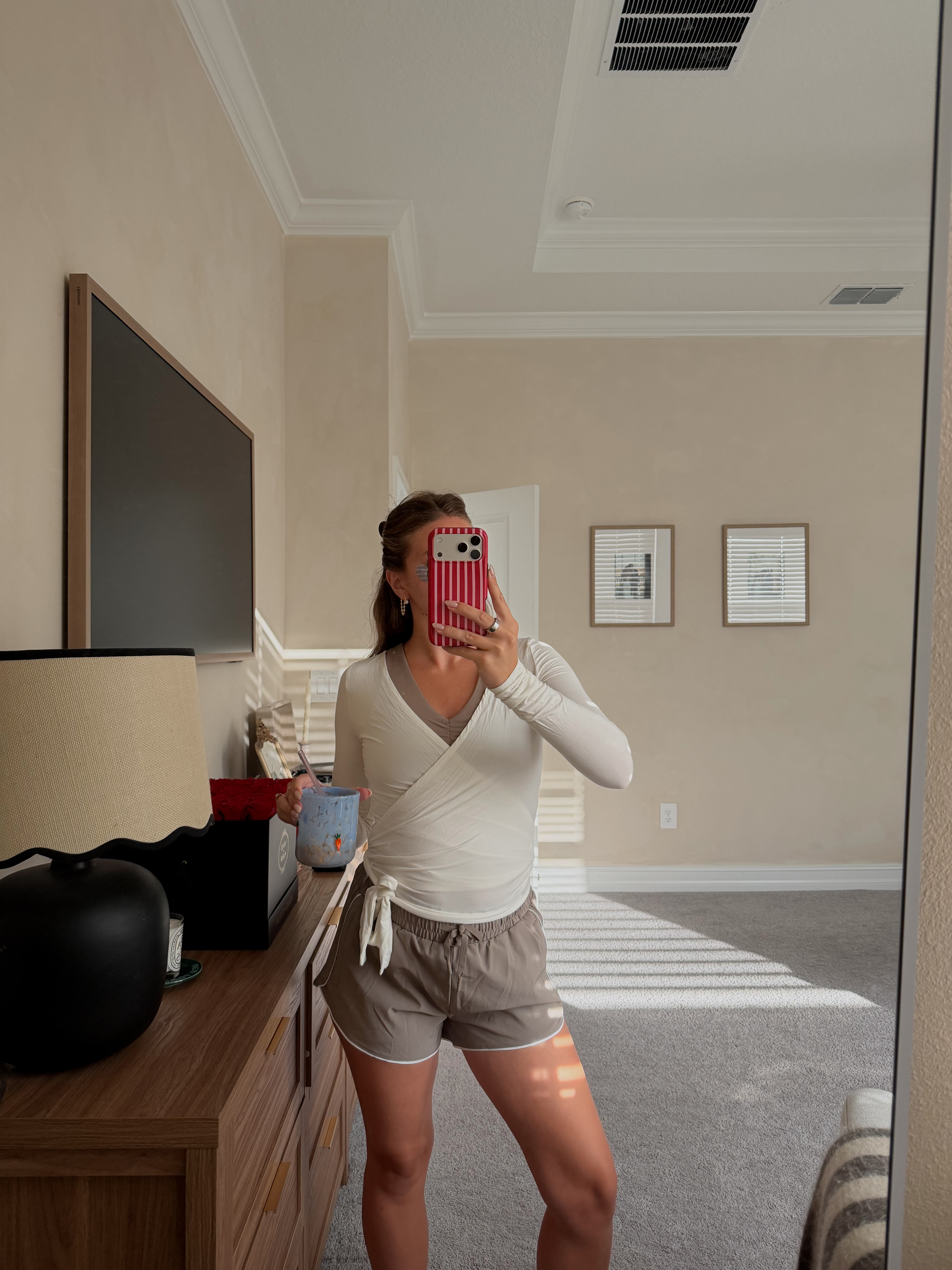 workout ootd! wrap top is white fox, linking similar <3 + my morning must haves: eye patches and a cute coffee glass! @saltproject 
@Sephora @Anthropologie 

#LTKActive #LTKfitnessgoals #LTKootd