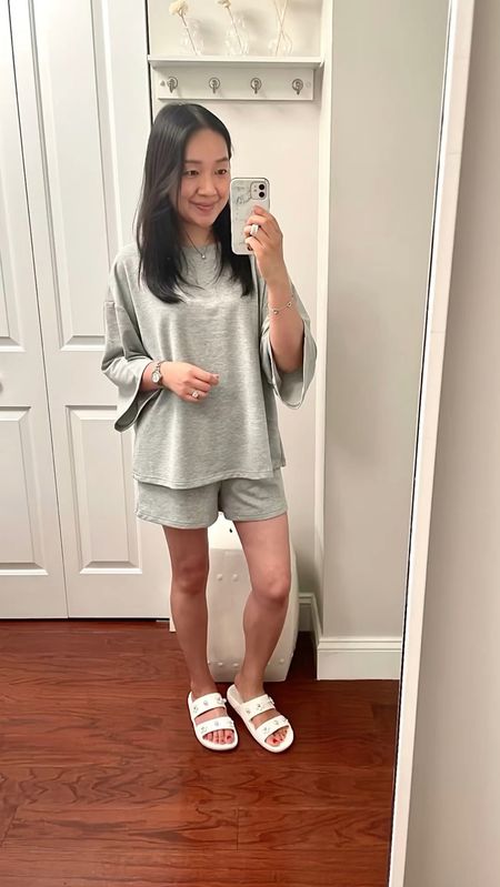 Lounge set in size S is an oversized fit on me for the top. The shorts fit well. I'm 5' 2.5" and 115 pounds. The grey set is a nicer material and arrived with less wrinkles than the white set in my previous LTK shop post.

White Crocs with cute flower and pearl charms. 

Let me know if you have any questions in the comments below!

Comfy outfit
Pajamas
Matching set

#LTKFindsUnder100 #LTKOver40 #LTKFindsUnder50