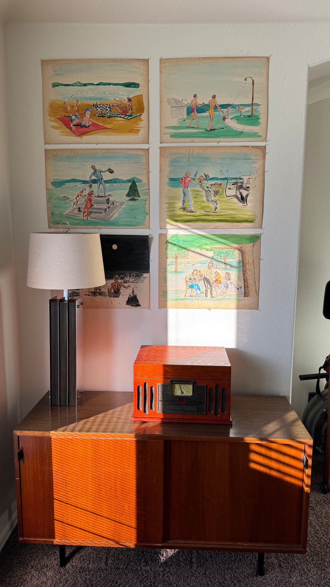 Mad Men 1960’s office vibe with a vintage style record player, table lamp and console. 

My vintage Laurel lamp and Knoll sideboard are the perfect vibe. I found very similar look alikes for you!

Sideboard
Credenza
Side table
Record table