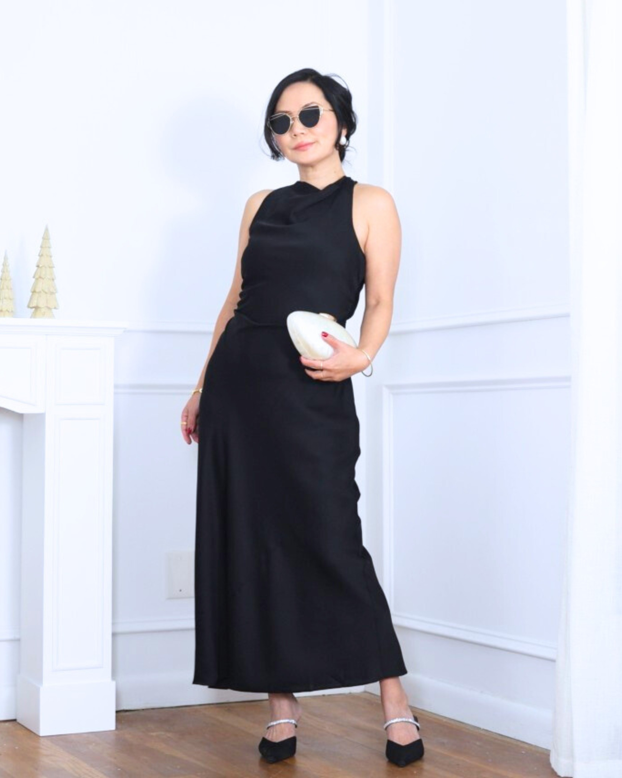 A black silk high-neck dress from Quince paired with embellished heels from H&M—simple, sleek, and made for moments when you want timeless elegance with a little sparkle. I’m 5’2, wearing size S.

#LTKHoliday #LTKOver40 #LTKPetite