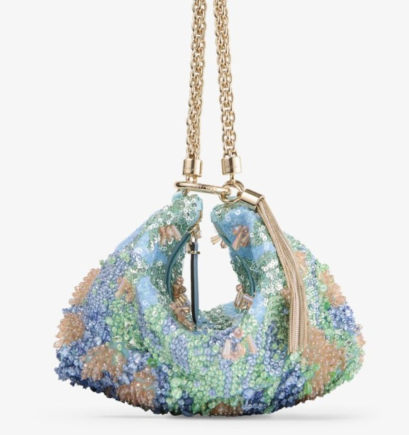 The ultimate finishing touch for your next special occasion ✨ The Jimmy Choo Callie clutch is crafted in luxurious blue satin and adorned with shimmering multicolour crystals and sequins for a truly glamorous look. Style it as a chic handheld pouch or wear the elegant chain over your arm—perfect for weddings, galas, cocktail parties, and formal evenings.

#LTKStyle #LTKHandbags #JimmyChoo #LuxuryFashion #EveningBag #DesignerBag #CrystalClutch #WeddingStyle #CocktailAttire #FormalFashion
 

 #LTKootd #LTKSeasonal #LTKOver40