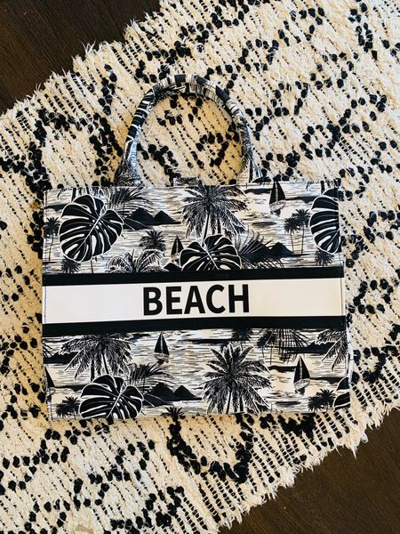 designer tote without a designer price tag. Seriously the perfect beach bag. Summer vacation and travel must-have! Comes in different colors and patterns, too. 

#LTKswim #LTKtravel #LTKunder50