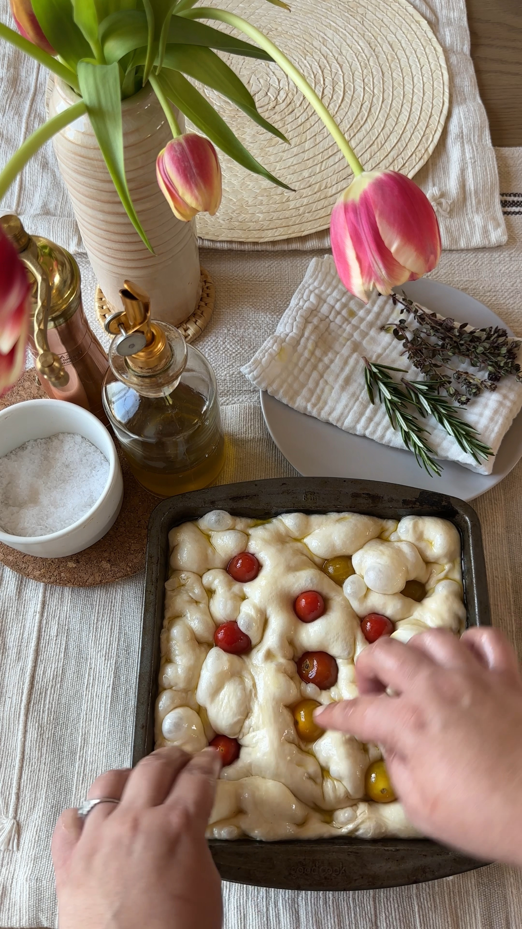 Making homemade focaccia with cherry tomatoes, thyme, and rosemary. Have to finish it with flakey sea salt from my magnolia for target salt cellar, my copper & brass Athena pepper mill, and olive oil from my glass cruet. #kitchentools #cooking

#LTKhome