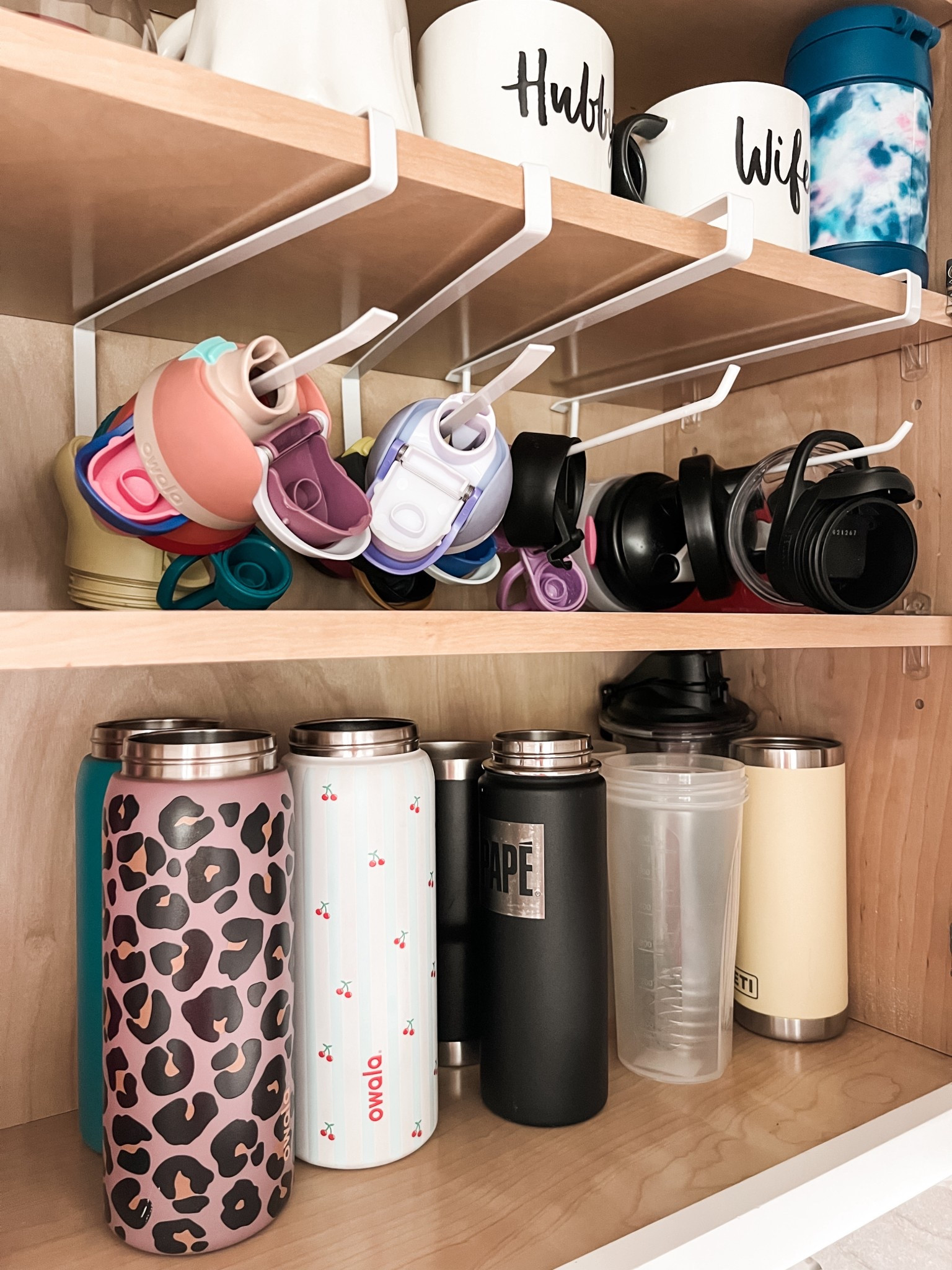 Obsessed with these water bottle top, shelf organizers 💧 ! Before, I was struggling with a mound of loose tops that would most likely fall out of the cabinet when I opened it. These organizers are game changing and fit right over the shelf creating a more organized space. They come in a pack of one or two and also five color options. 

#amazon #organization #organized #organize #shelf #water #bottle #lid #top #water #mug #coffee #tumbler #cabinet #home #owala #stanley 



#LTKHome