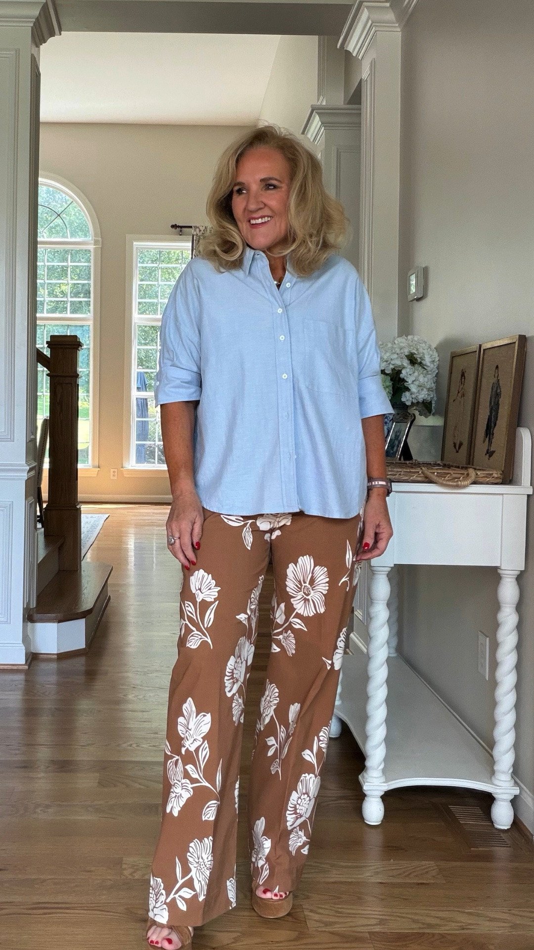This light blue button-front shirt is the perfect balance for these pretty floral wide-leg pants. The relaxed fit keeps things comfortable, while the soft blue and warm brown color combination feels fresh, feminine, and pulled together.

💡 LTK MADE EASY
❤️ Heart = Support my posts!
🔖 Save = Get sale & restock alerts
📋 Lists = Keep favorites organized
📲 Share = Send lists and products to a friend. Hello, Christmas List!
💬 Comment = Ask me anything about what I'm wearing.:-)

#LTKootd #LTKWorkwear #LTKOver40