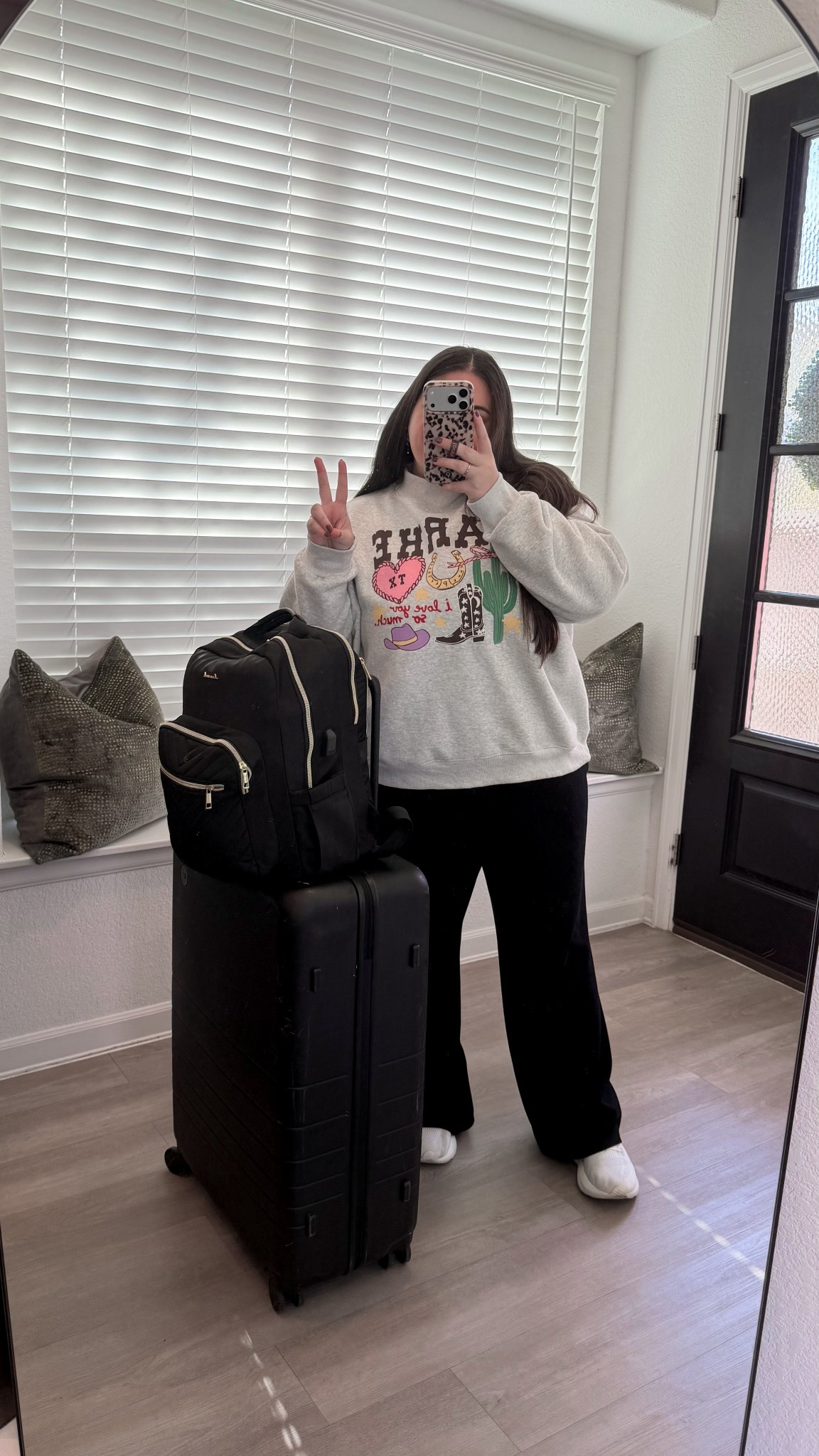 Travel outfit. Travel OOTD. Parke sweatshirt. Texas style. Suitcase. Traveler.

#LTKTravel #LTKootd #LTKdayinmylife