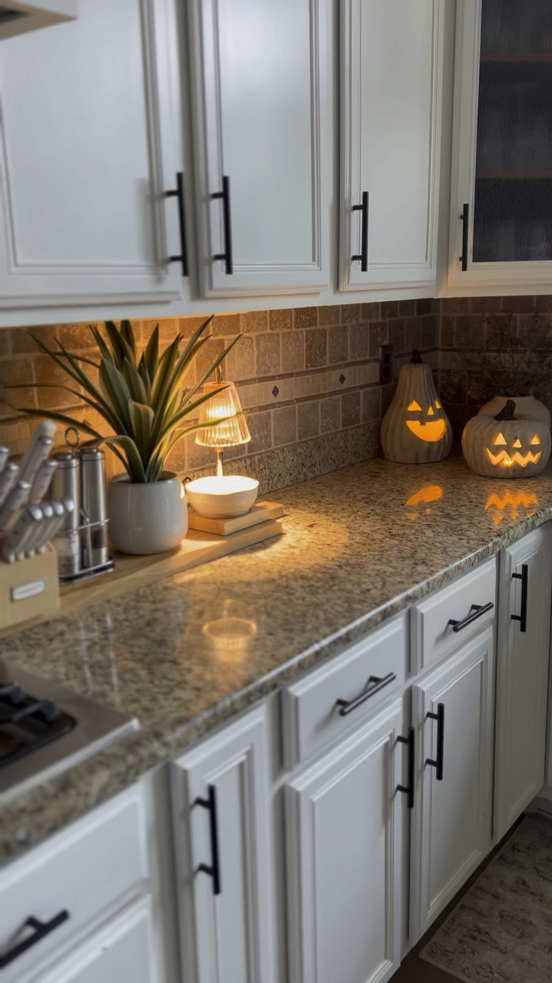 Fall kitchen countertop styling idea with these beautiful clay ceramic style light up pumpkin jack o lantern from World Market. Super fast shipping. Grab them while still available and under $30! 

#LTKSeasonal #LTKVideo #LTKHome