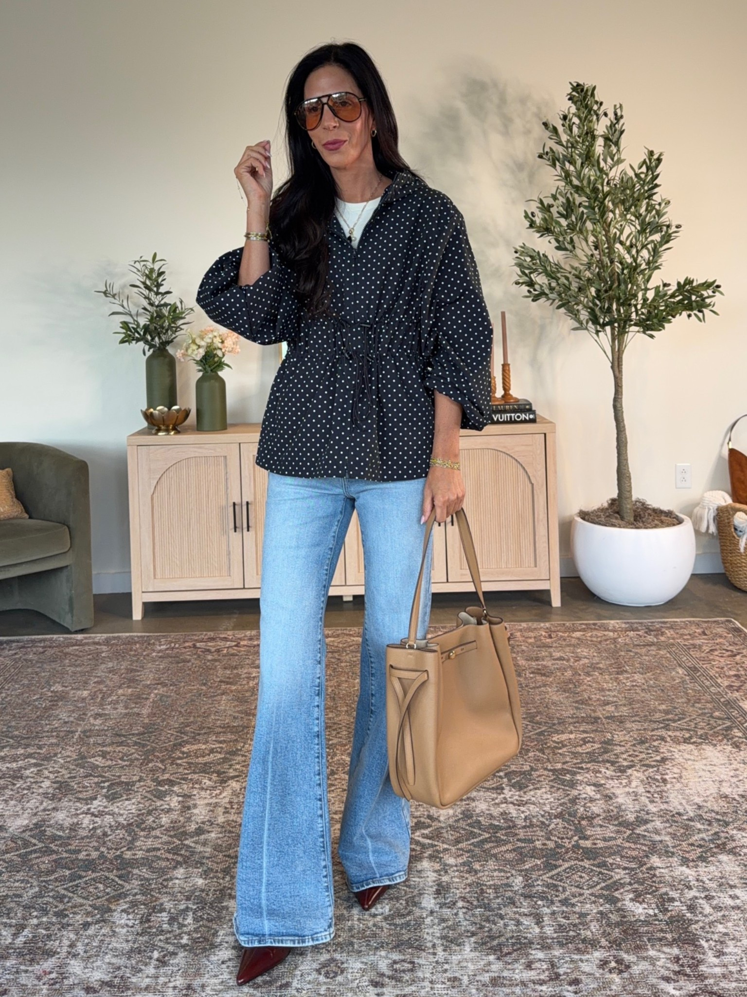 NEW from Target and 100% waterproof!  
Wearing a size small 
Denim- wearing a 27 long