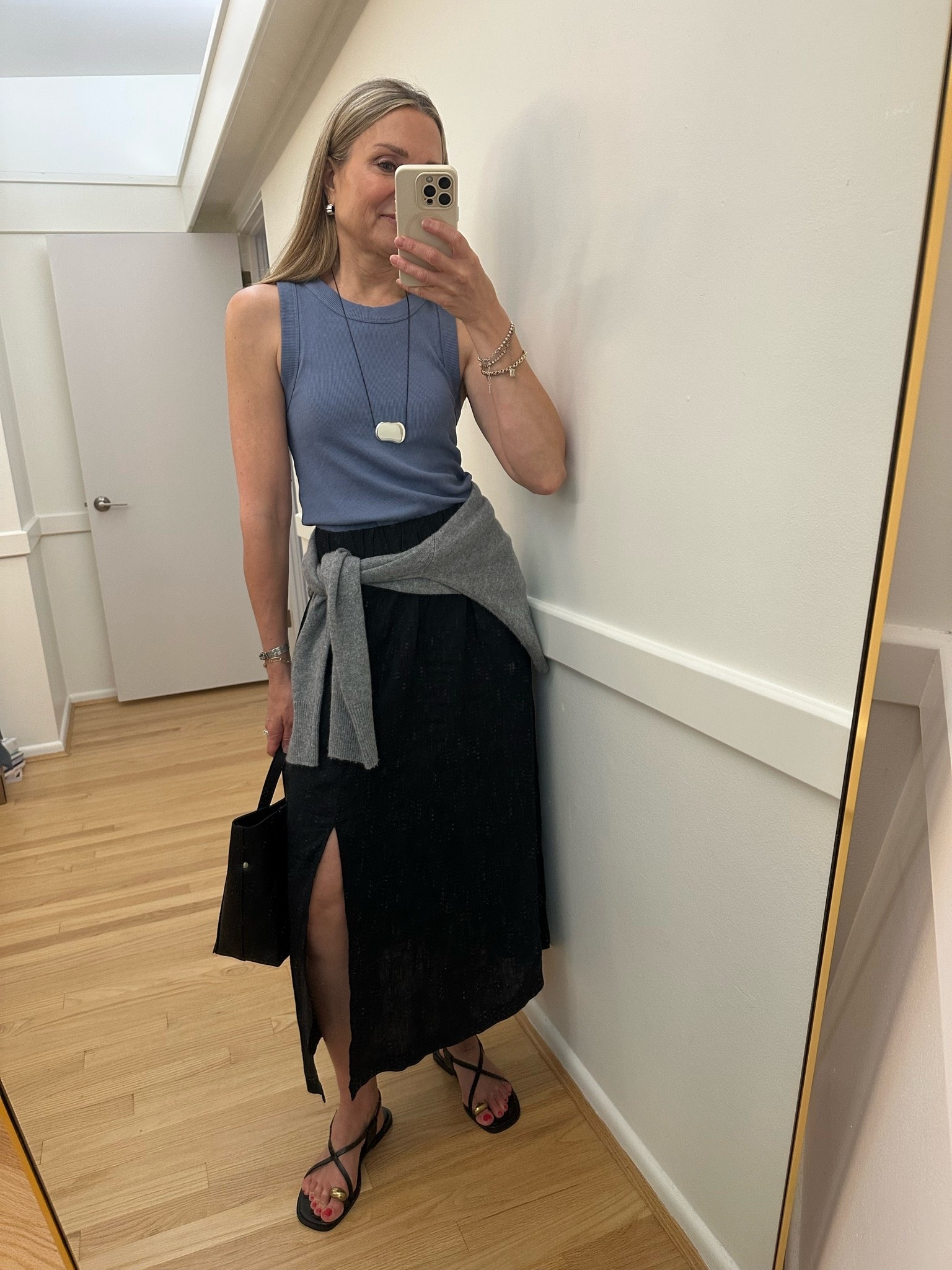My favorite kind of everyday summer look: casual @Quince black linen skirt? A great fitting tank, cute sandals, and a cool statement cord necklace to tie it all together!

#LTKootd #LTKOver40 #LTKgrwm