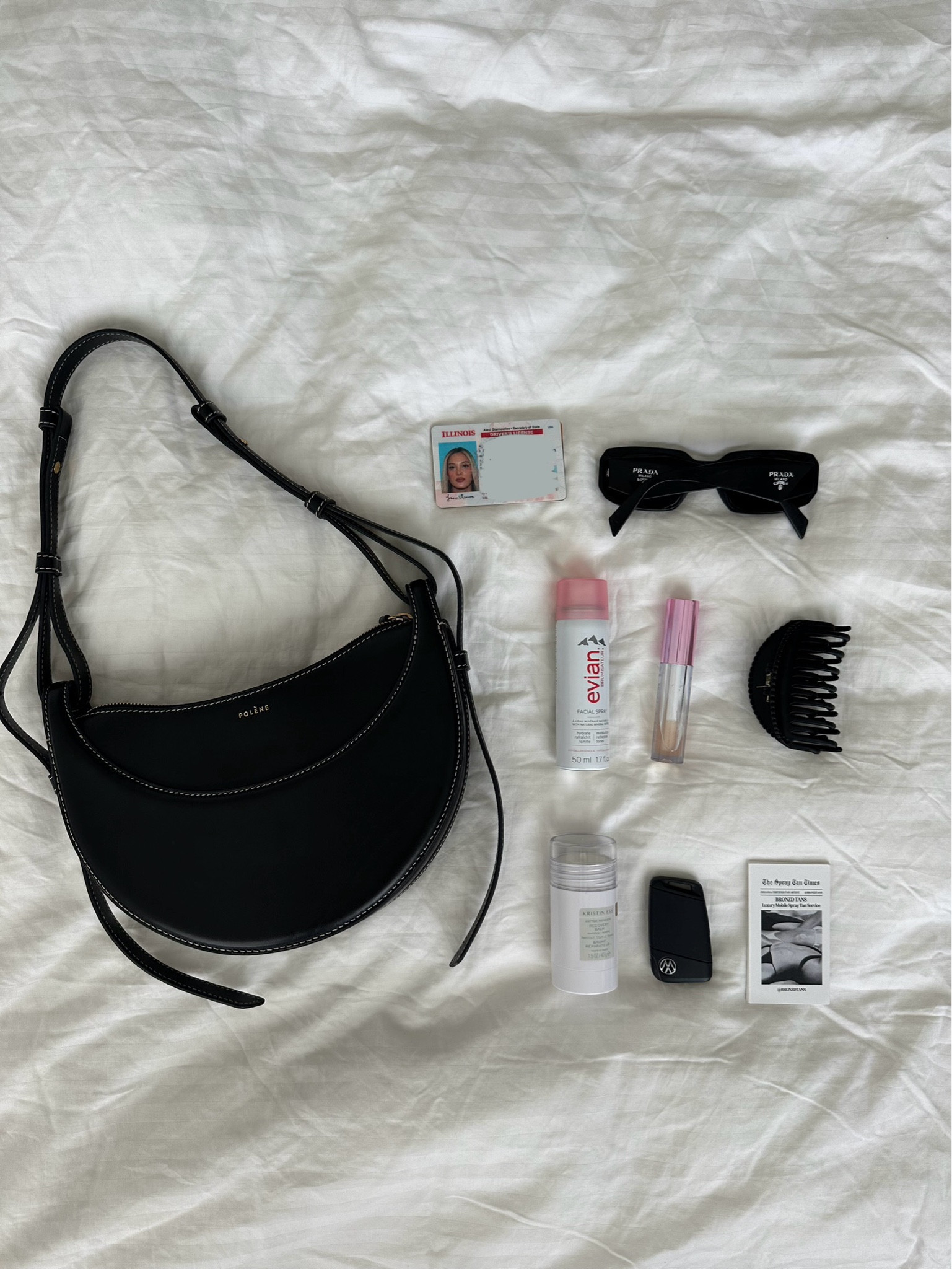 What’s in my bag.. bag is Polène but found a dupe on Amazon! 

What’s in my bag. Bag essentials. Facial spray. Hair balm. Products for hair. Hair bun essentials. 
