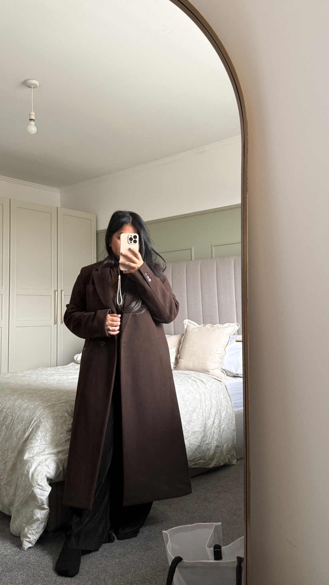 Had to share my coat again because I’m obsessed 🤎 My coat is from Uniqlo.

Also sharing my bedroom details: mirror from William Wood, bedding from Dunelm, and cushions from John Lewis — all tagged for you to shop easily! ✨ Perfect cosy vibes for autumn 🍂

#LTKhome #LTKautumn #LTKworkwear