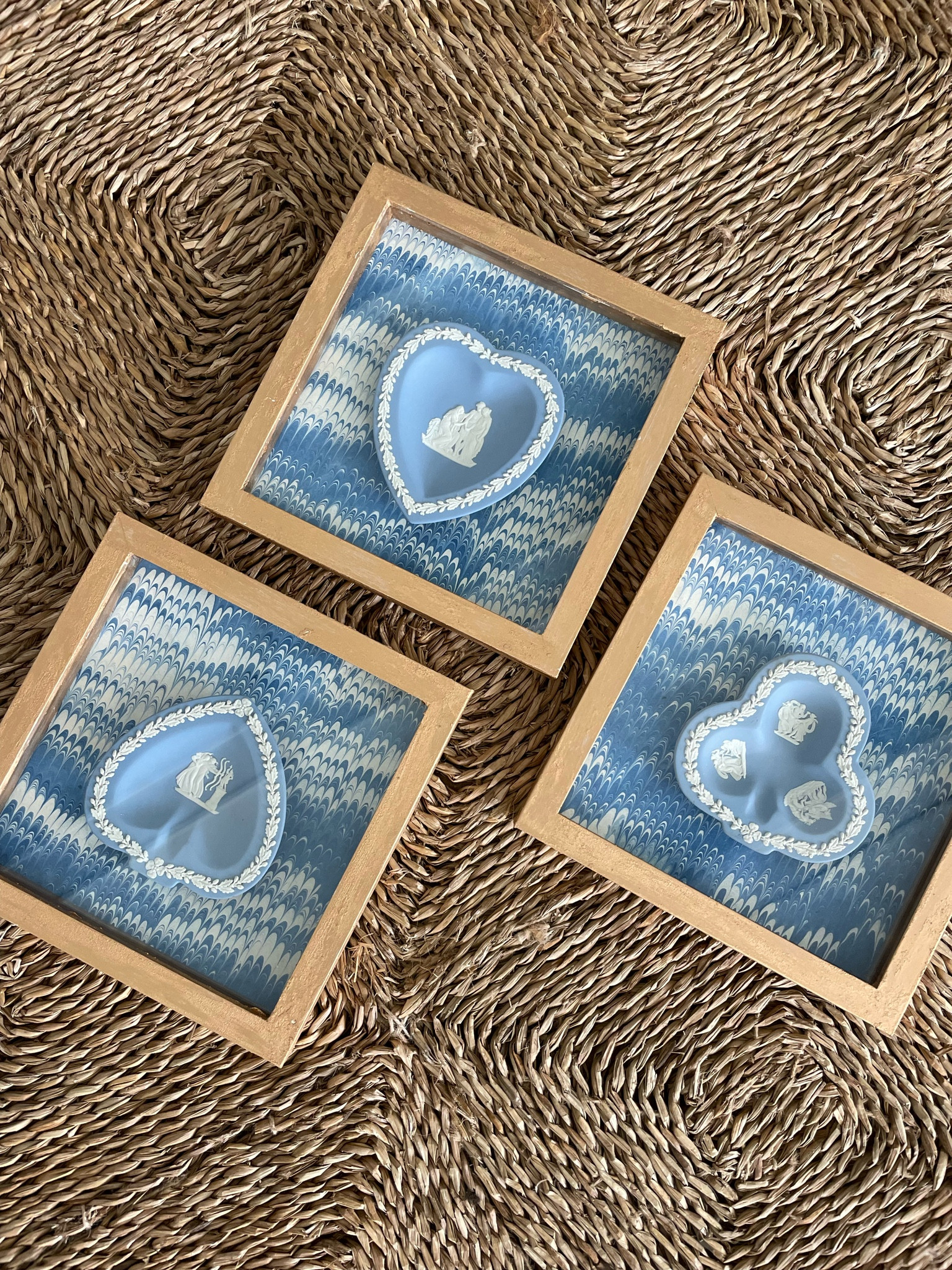 A really easy DIY! I thrifted these Wedgwood dishes then used antique gold rubb n buff on a white shadow box frame, put some pretty marbled paper in the back, and voila! 

#LTKstyletip #LTKhome #LTKunder50