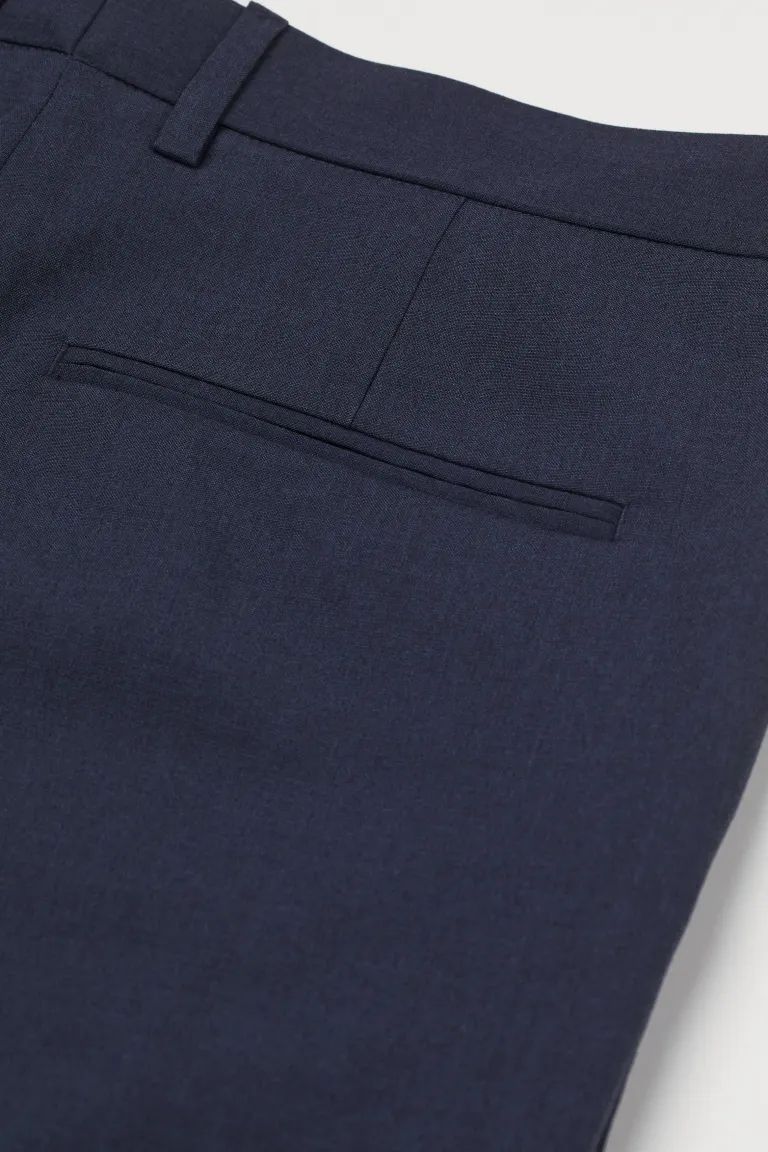 Suit pants in woven stretch fabric. Concealed hook-and-eye fastener, zip fly, side pockets, and w... | H&M (US + CA)