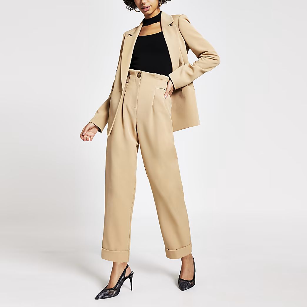Beige buckle side tapered peg trousers | River Island (US)