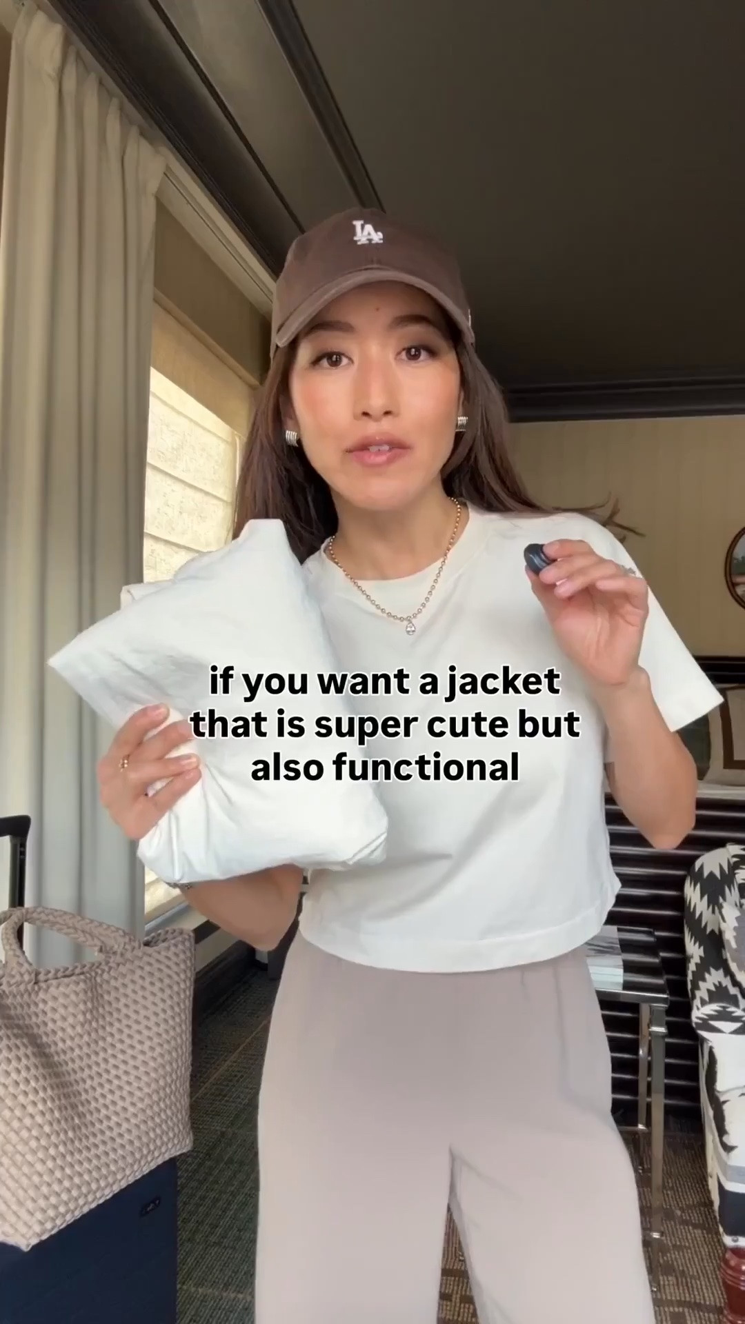 Just restocked! Sizing info below: 
• Jacket in Classic Fit size 2 (I'm usually xxs in other brands.) water resistant with hood. 
• Aritzia pants 2XS, hemmed. Their Short is still long on me, so sometimes I just get regular length and hem. Elastic waist, wrinkle resistant, drapey fabric. 
• lululemon Crop T-Shirt xxs 
• NB sneaker Kids 4, fits like women’s 6 (I could've done kids 3.5 since these are roomy). In their womens I'm a size 5. 
• 47 brand hat 
• Naghedi medium tote in cashmere 
• Away bigger flex carry-on suitcase 

Travel outfit, airport style, petite friendly mom style

#LTKPetite #LTKTravel #LTKootd