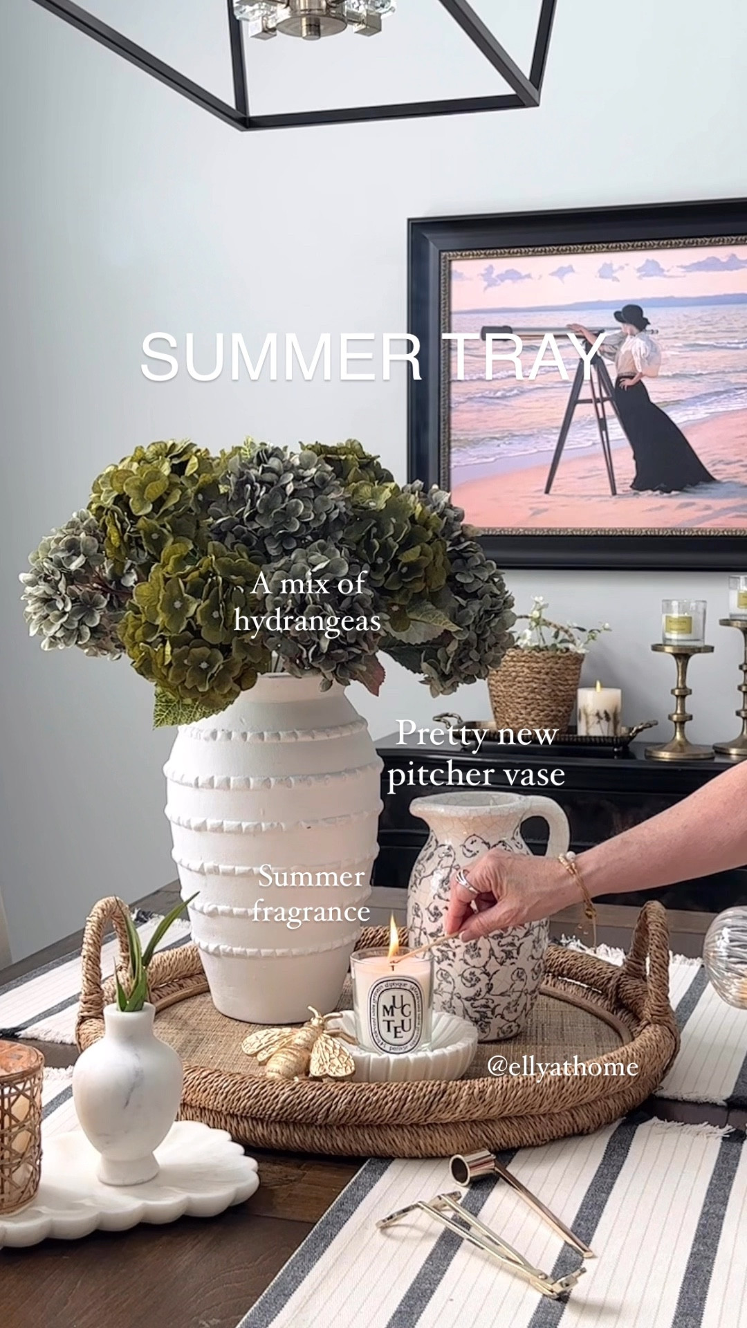 Summer tray styling with beautiful hydrangeas in 2 colors, tall vase, new pitcher from Walmart, summer fragrant candles, my favorite is Diptyque May candle of the month. Shop trays, brass candleholders, coastal candles, artwork, candle accessories, chandelier. Summer home decor accessories. 

#LTKHome #LTKFindsUnder50 #LTKStyleTip