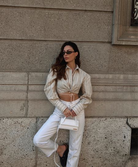 Jacquemus beige crop shirt and white jeans outfit inspiration🤍

Use the code “NOEMI30” for 30€ off on purchases over 400€ and 60€ off on 600€ or more on your Farfetch order. for new customers only! Valid until 17-06-2023. 

Summer style, minimalistic outfit, Jacquemus shirt , Mango white jeans, Birkenstock mules Boston, Saint Laurent sunglasses, Farfetch, Italy. 

#LTKeurope #LTKfit #LTKSeasonal