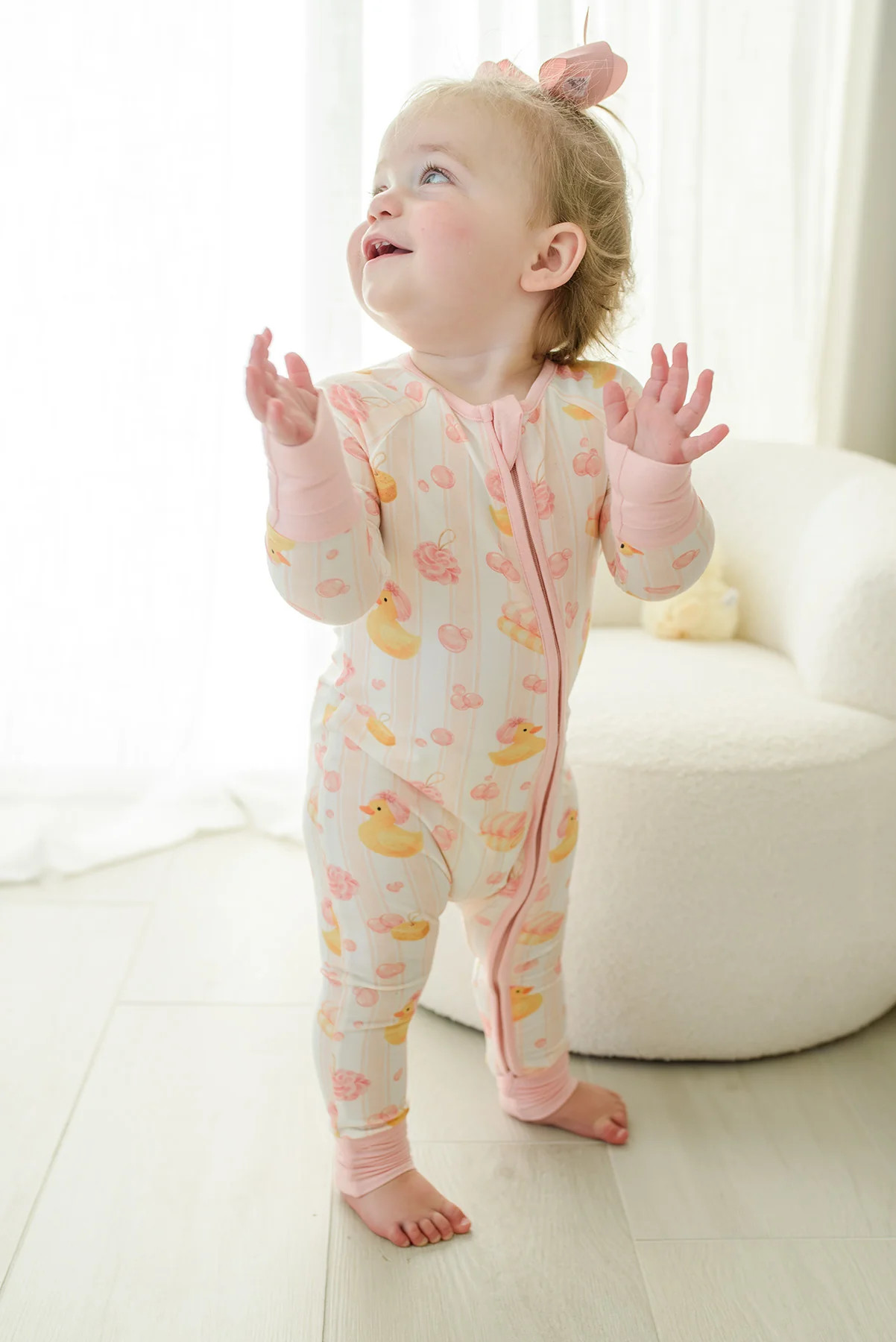 Convertible Bamboo Zip Romper | Bubble Duckies Pink | Caden Lane