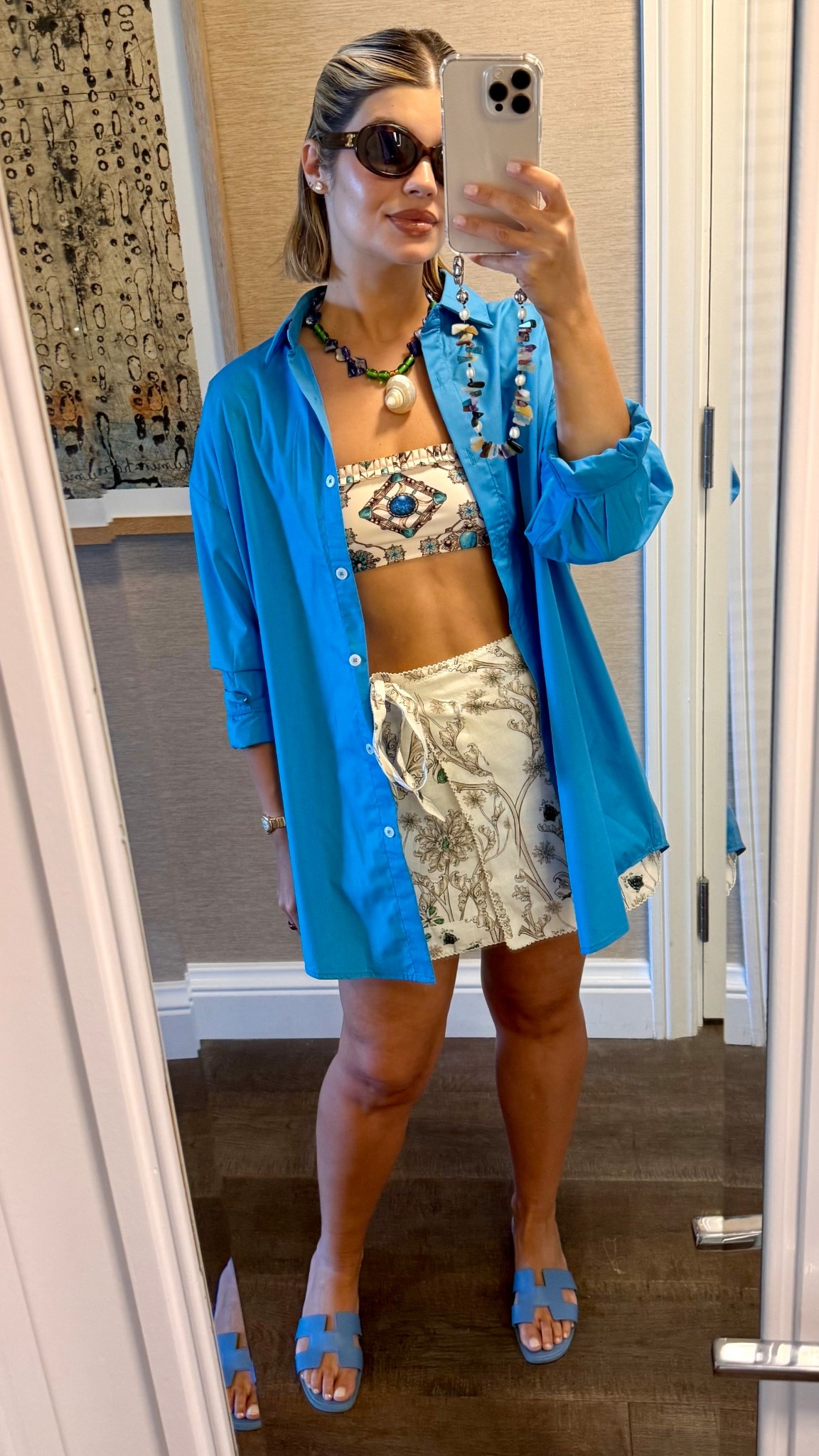 Hawaii Beach Fits: 
- Agua by Agua Bendita swim - Old season, I LOVE these swim sets with the matching skirt. Looks so put together and worth the splurge. I use them year after year. Linked new season! (Run tts - I’m wearing M top and bottom) 
- Seashell necklace I bought in Bali at an outdoor market - linked fun seashell options. These are great accessories for summer to dress things up / fun statement pieces for anything 
- Hermes Oran sandals 
- Oversized shirt from ASOS! Great to throw on top of tanks too 
- Celine Sunnies 

#LTKTravel #LTKSeasonal #LTKSwim