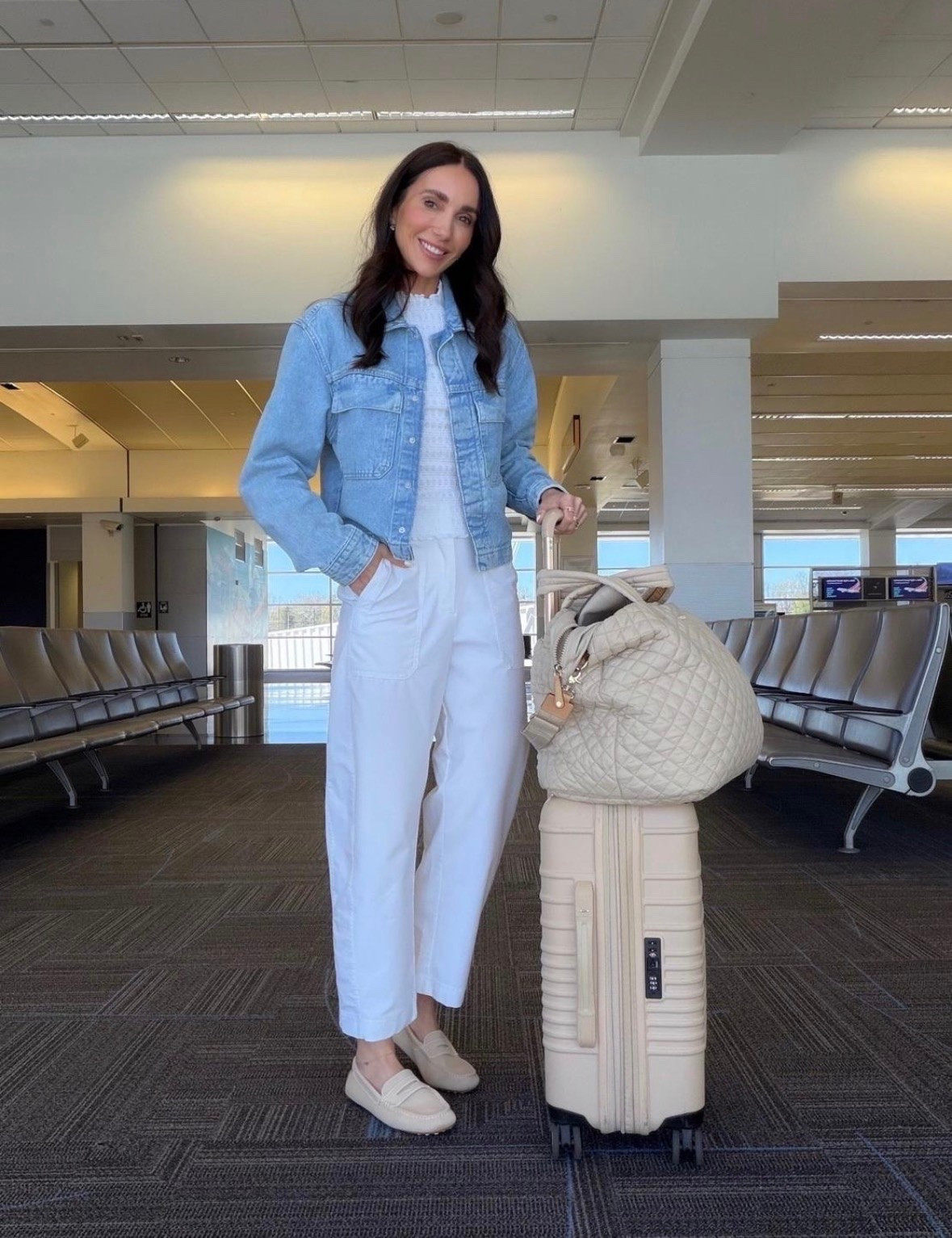 This travel outfit is the perfect mix of comfortable and polished. The white jumpsuit keeps things easy for a travel day, while the denim jacket adds a classic layer that works from the airport to your destination. Comfortable shoes and a roomy tote make this a practical yet elevated airport look.

airport outfit, travel outfit, white jumpsuit, denim jacket outfit, comfortable travel style, chic airport outfit, vacation outfit, casual chic style, travel essentials, summer wardrobe, annabrstyle

#LTKTravel #LTKootd #LTKOver40