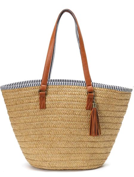 Darling straw tote with blue and white striped lining. Zip top, interior pockets. Great price! I love carrying this for summer. 💙

#LTKFind #LTKSeasonal #LTKunder50