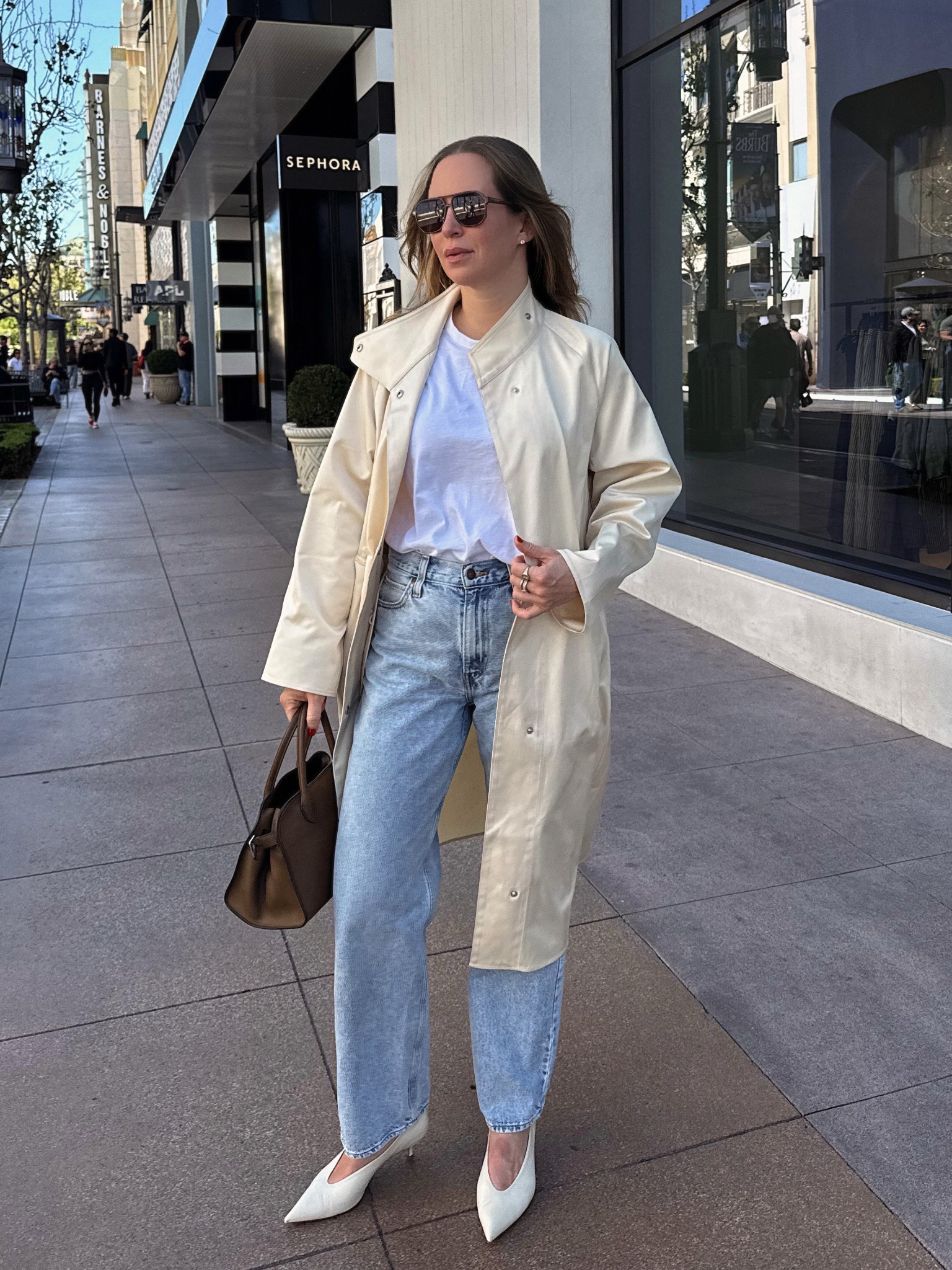 Sizing: the trench runs oversized. I sized down to a small.  The shoes are so comfortable! I sized up 1/2 a size. Wearing a M in the tee (use code HELENA15) 

#LTKspring #LTKOver40