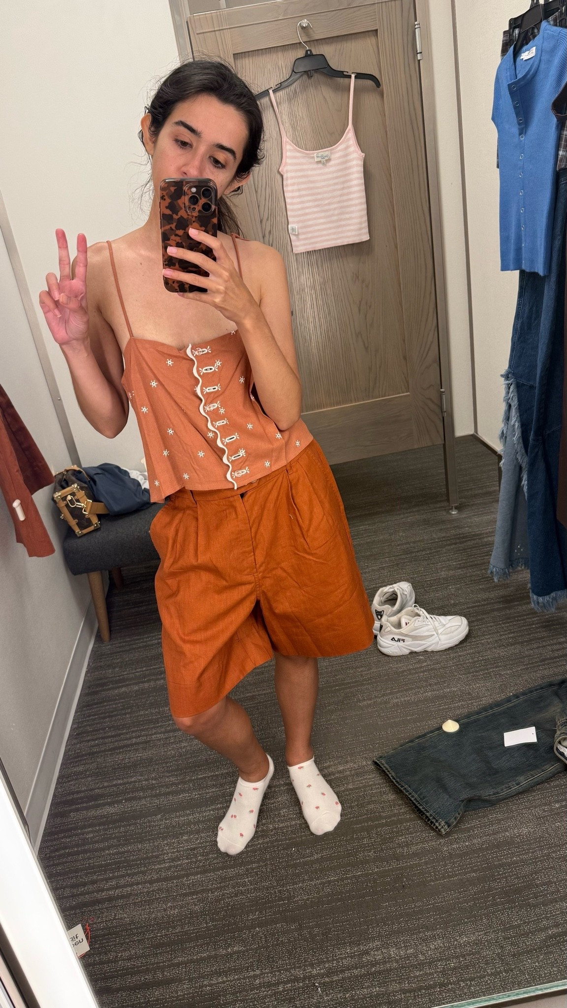 Take me to Seville.. Spanish style inspiration. Bermuda shorts + a slouchy orange tank top perfect for summer from the Nordstrom Anniversary Sale!