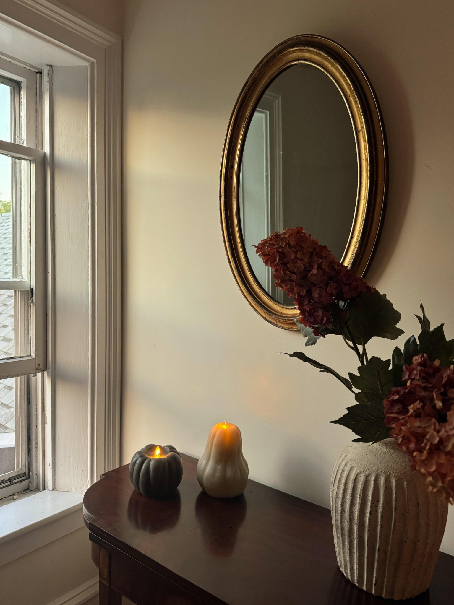 Flickering flameless pumpkins, faux hydrangeas, vase and a similar mirror (mine is antique)

#LTKSeasonal #LTKHome #LTKFallSale