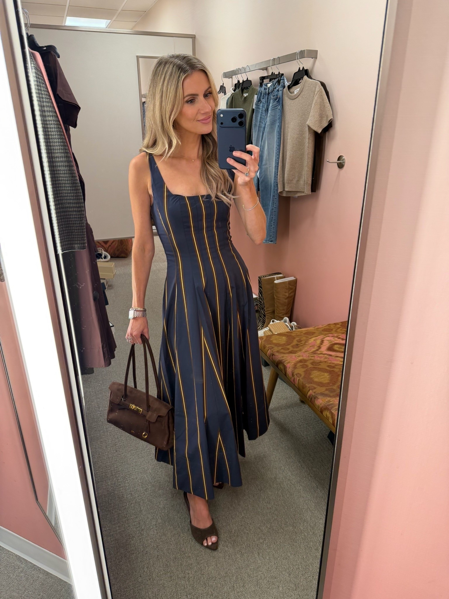 This navy striped dress feels classic with just the right amount of structure. I styled it with brown heels and a chocolate suede bag for a polished look that’s perfect for weddings, dinner, or special events. It’s one of my favorite dress finds from the Nordstrom Anniversary Sale.

#LTKgrwm #LTKootd #LTKSaleAlert