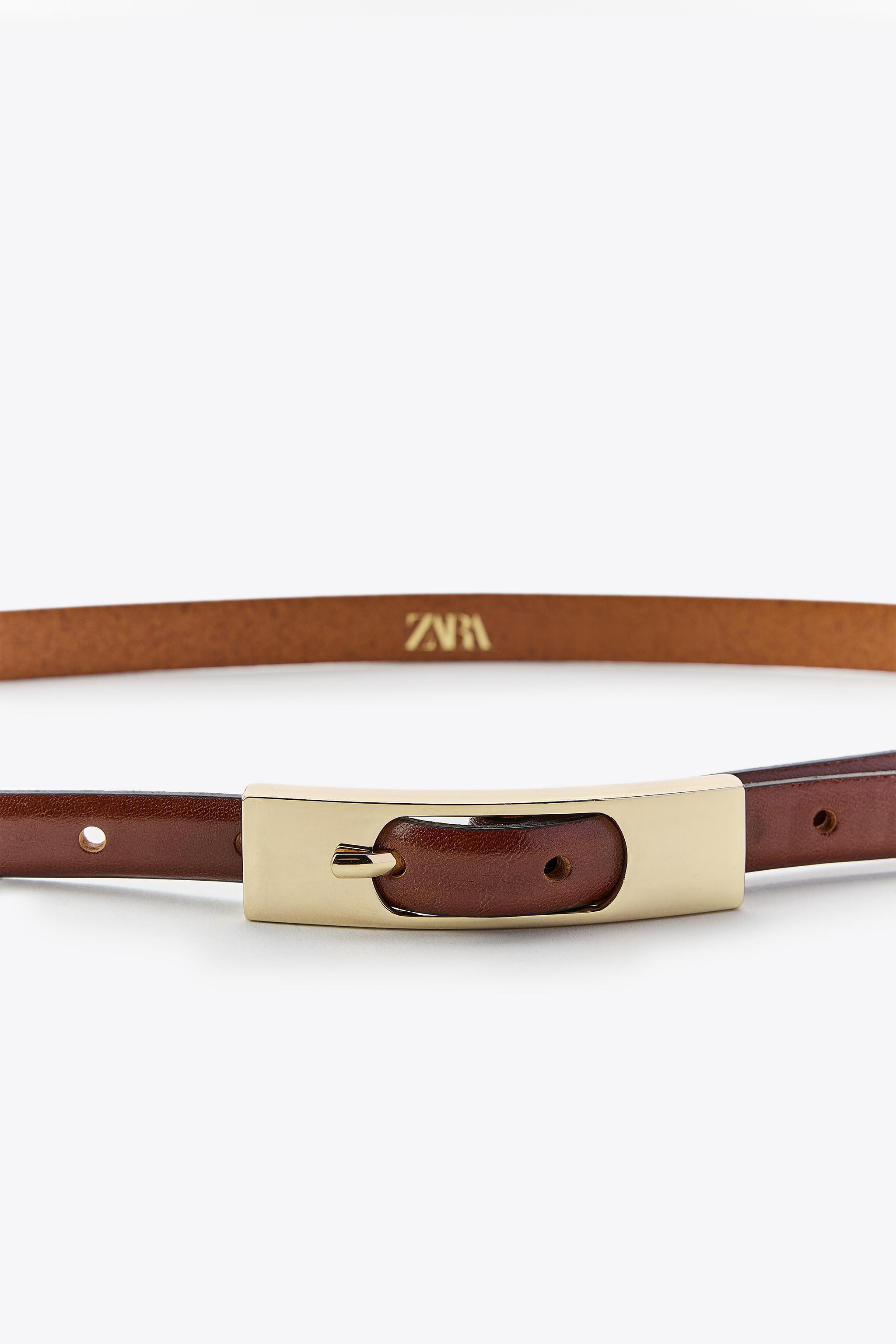 Thin belt, 1.5 cm wide, with main fabric made of 100% leather. Rectangular metal buckle. | Zara US