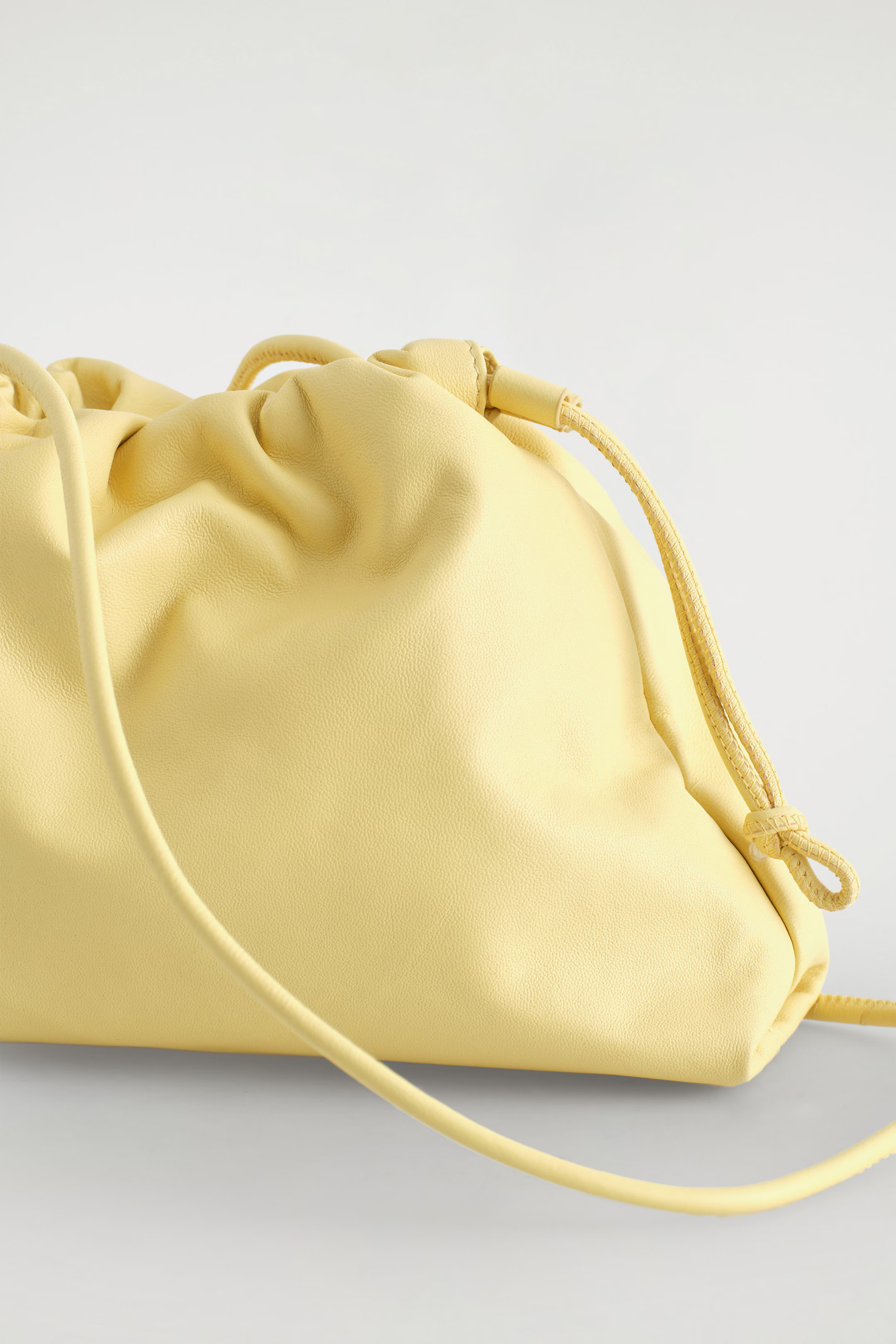 MINI CAVATELLI CLUTCH BAG - LEATHER - BUTTER YELLOW | COS | COS (EU)