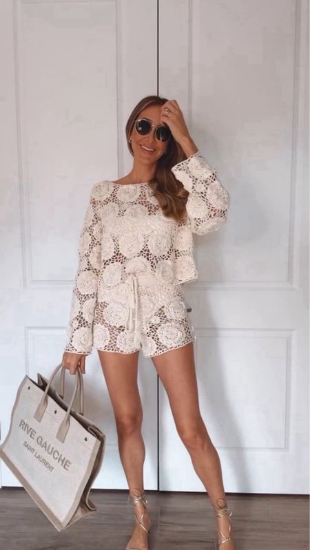 Gorgeous vacation outfits. 
Cover ups edition.
This crochet cover up set from Revolve is so chic and feminine. I love this two-piece swimsuit, also from Revolve. The belt detail makes it so elegant and stylish. I love this beige rive gauche tote.
These sandals from Amazon are so chic and I love the quality🙌🏻
Everything fits true to size
Wearing size small

#LTKitbag #LTKstyletip #LTKswim