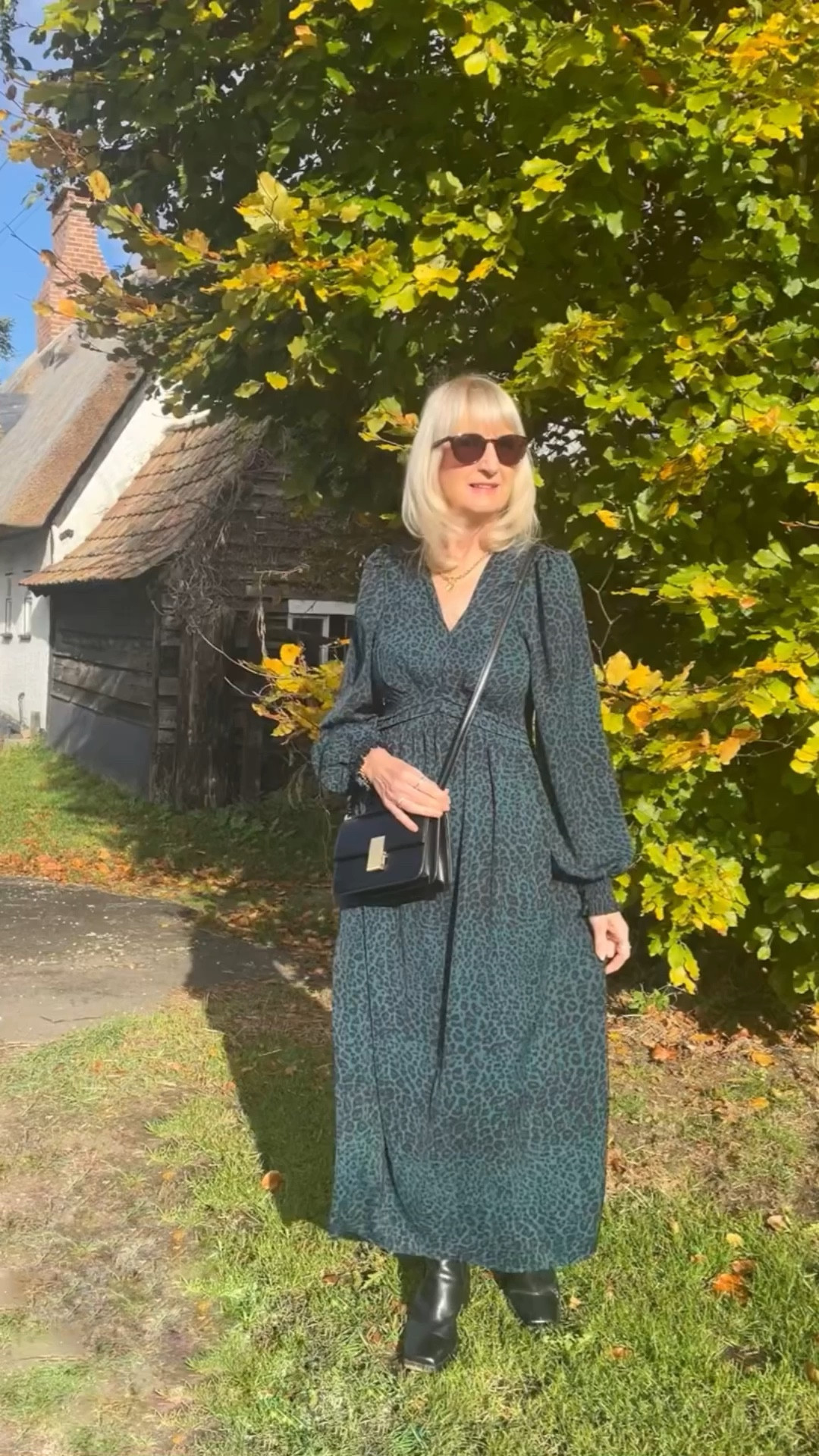 Autumn Outfit
Green animal print midi dress with long puffed sleeves. Worn with black crossbody bag and western style ankle boots. 

#LTKautumn #LTKshoes #LTKeurope