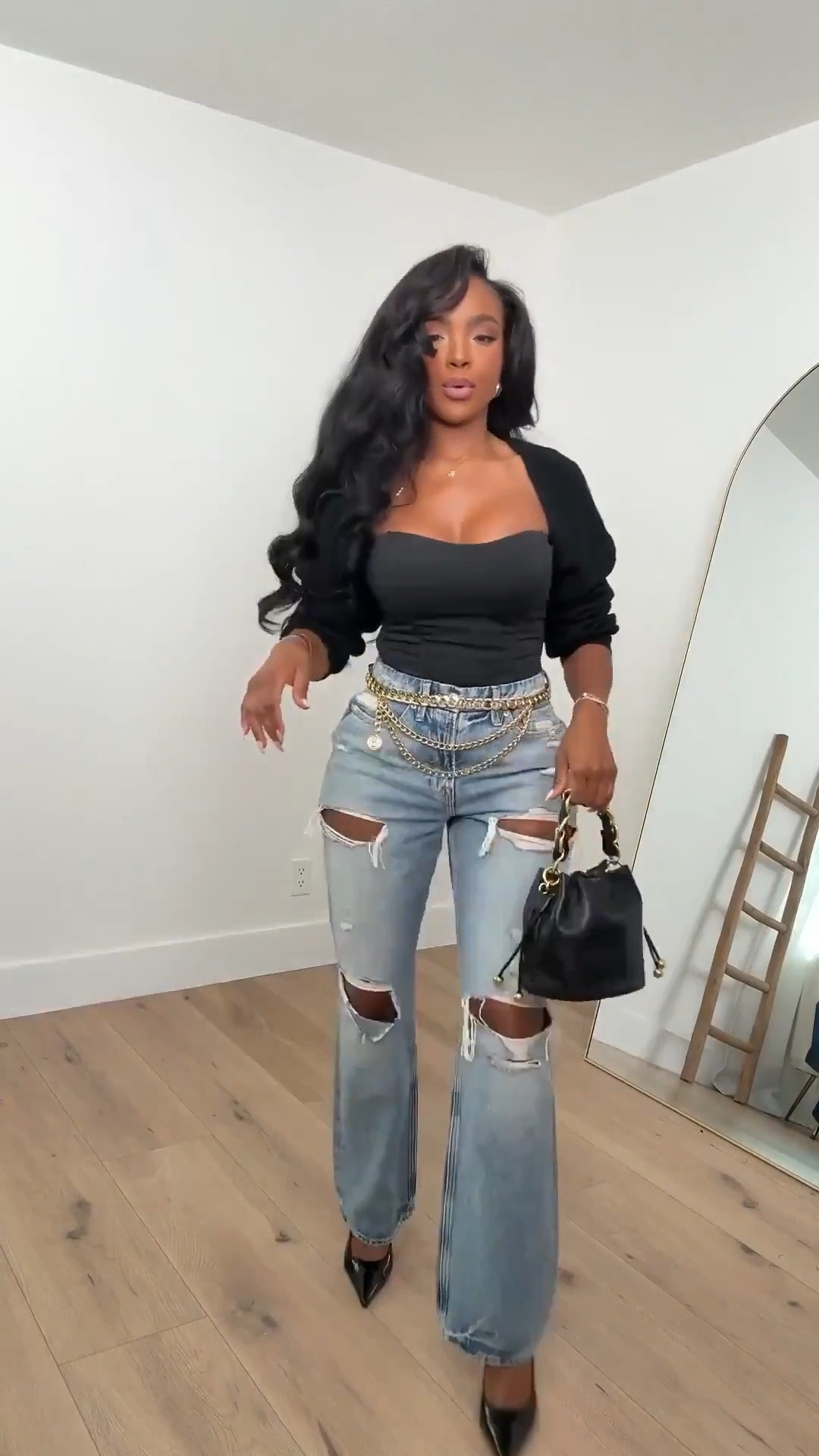 Denim, but make it a little extra. ✨👖

Ripped jeans + a fitted black top + gold chain details = the easiest way to turn denim into a whole LOOK. I love the mix of edgy and feminine, and the heels take it straight from casual to going-out.

Wear this for date night, girls’ night, dinner, cocktails, a concert or anywhere you want your jeans to do more than just be jeans.

Wearing a size Small | 5’4” | 140 lbs | 34D - 27 - 40

Download the FREE LTK app & follow me (@kirasfashionfinds) to shop the look.

distressed jeans outfit, ripped jeans women, going out outfit, date night outfit, girls night outfit, black top outfit, denim outfit ideas, edgy chic outfit, casual date night look, fall outfits 2026, fall fashion women, petite fashion, mom style, jeans and heels outfit, trendy denim, concert outfit ideas, elevated casual outfit, night out fashion