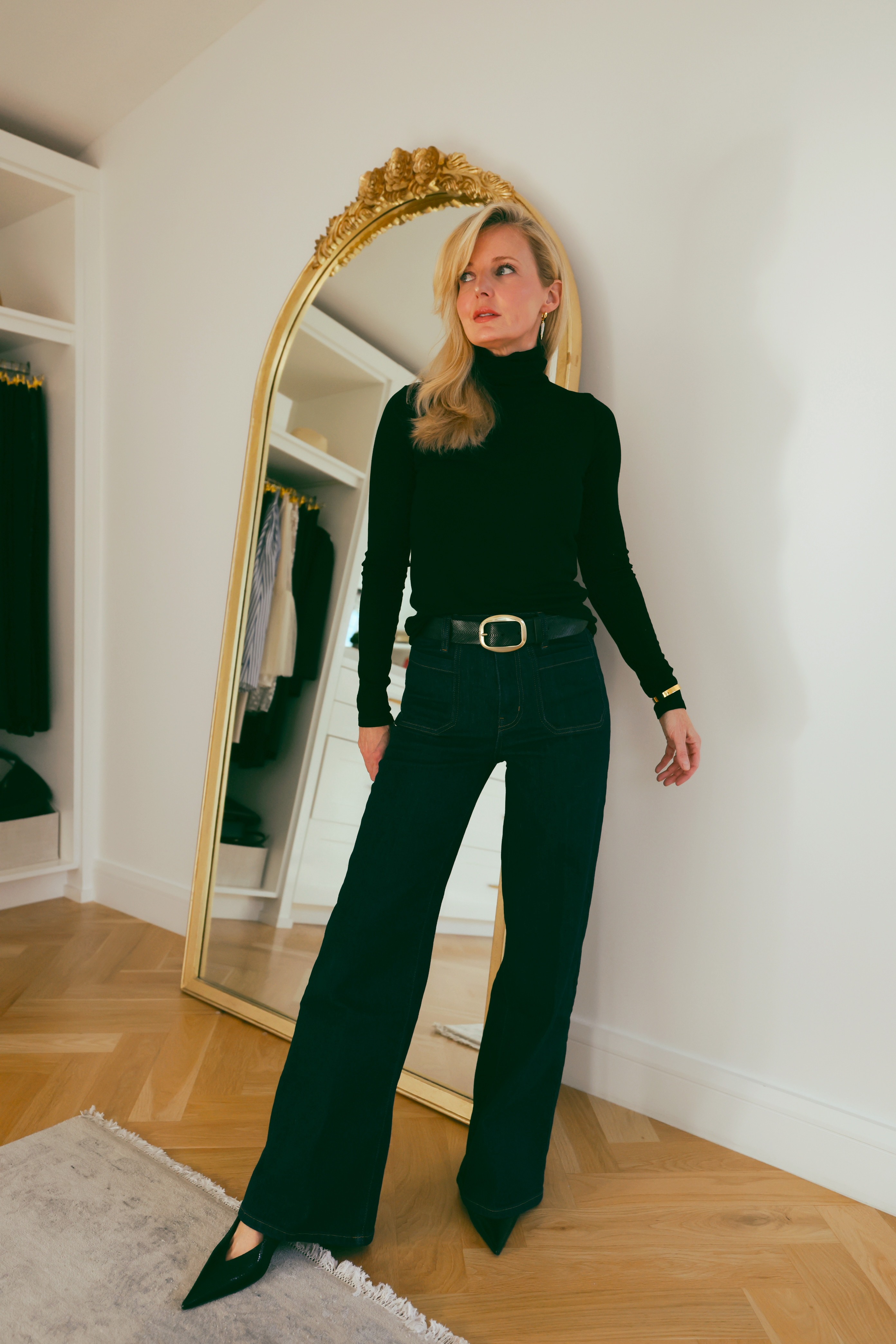 All black with a statement belt is one of the most polished things you can wear!

The FRAME patch pocket dark wash jeans with a black turtleneck and wide black leather belt with gold buckle; the belt cinches the waist and creates definition right where you want it. Black pointed toe heels and a gold cuff keep the hardware cohesive. Sleek, sophisticated, completely effortless.

#LTKgrwm #LTKOver40 #LTKSaleAlert