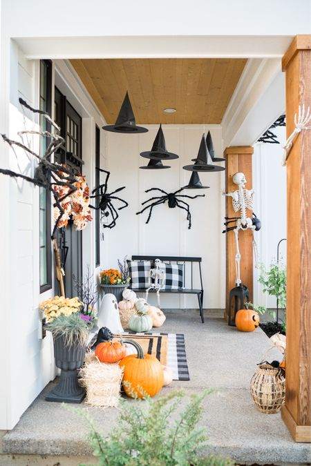 Halloween porch decor with witch hats, skeletons, and spiders! 

#LTKfindsunder50 #LTKHalloween #LTKhome