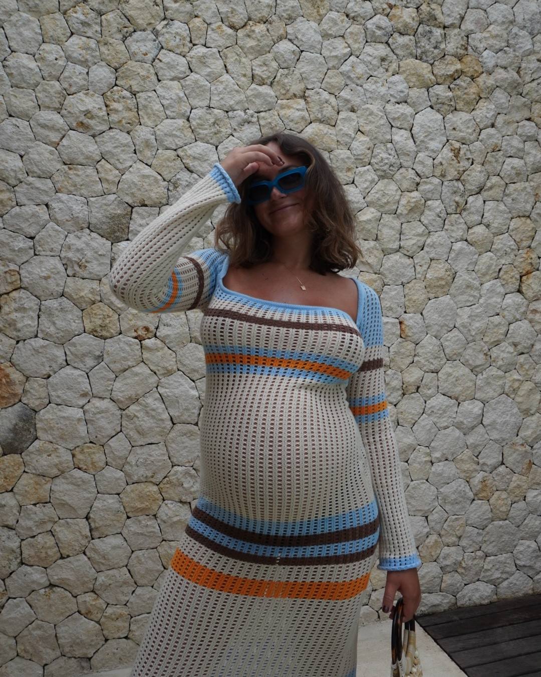 Vacation dressing with the bump. Crochet & knit dresses were my best friend when pregnant and they carried me through my baby moon in Bali. I wore my pre-pregnancy size here which was an AU8.

#LTKtravel #LTKmaternity #LTKaustralia