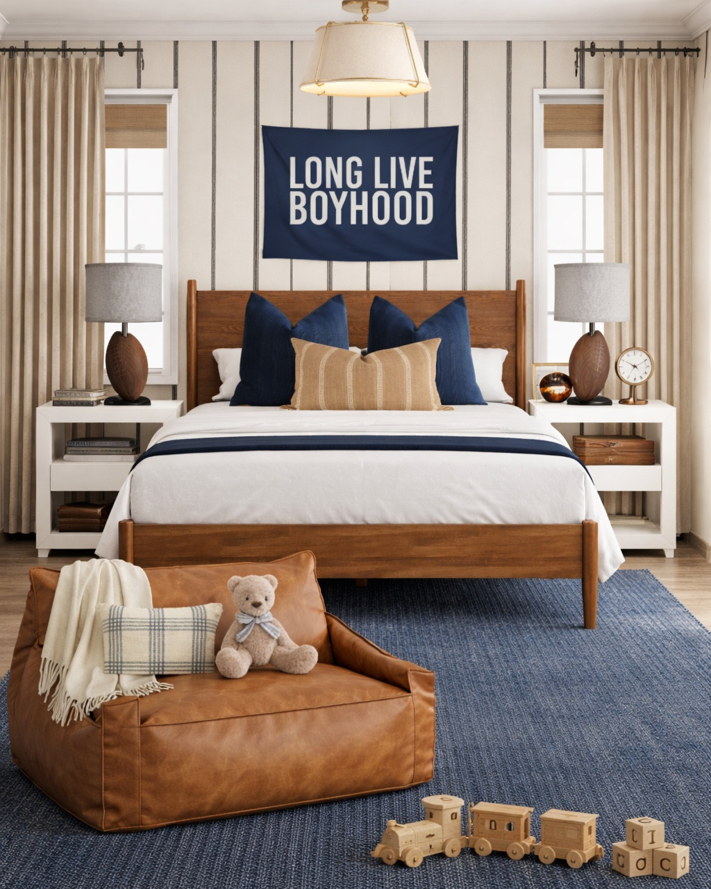 Classic boys bedroom design with a modern traditional feel 🤍

This space mixes warm wood furniture, navy blue accents, and soft neutral bedding for a timeless boys room that can grow with him for years. The striped wallpaper, “long live boyhood” wall banner, and layered pillows create a cozy yet tailored look that feels elevated but still playful.

Sharing all the details including the upholstered bed, wood bed frame, white nightstands, table lamps, navy area rug, leather lounge chair, boys room wall decor, and styling pieces to recreate this classic boys bedroom design in your own home.


#LTKBaby #LTKHome #LTKKids