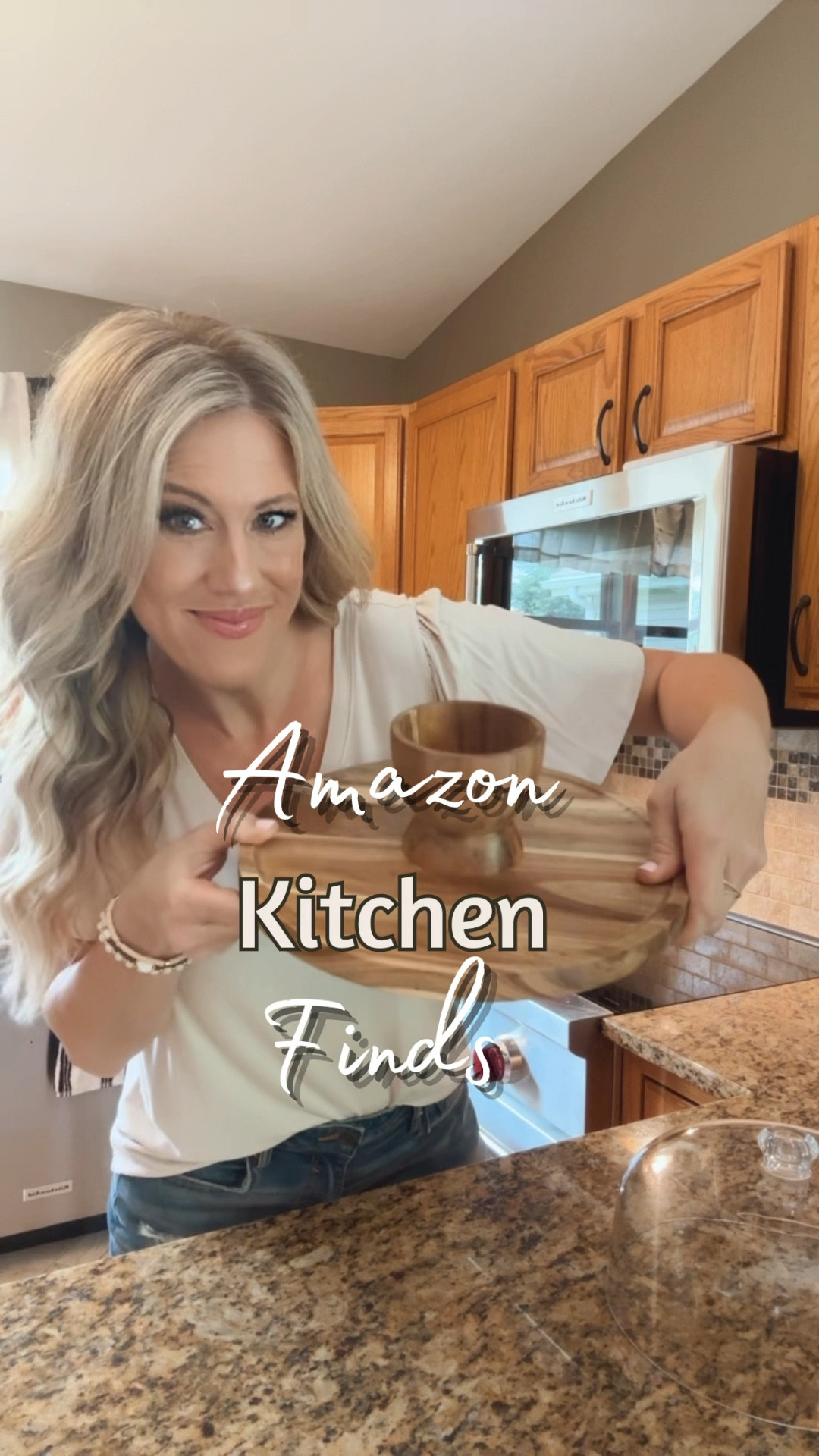 These are five of my favorite Amazon kitchen finds! Shelf cup organizers/space savers, a chilled condiment caddy that I use more than I thought I would. A cake stand that is a two in one genius, space, saving gadget. A popcorn popper that comes in two different sizes and melts your butter for you. And a fridge yogurt organizer.

#LTKVideo #LTKFindsUnder50 #LTKHome