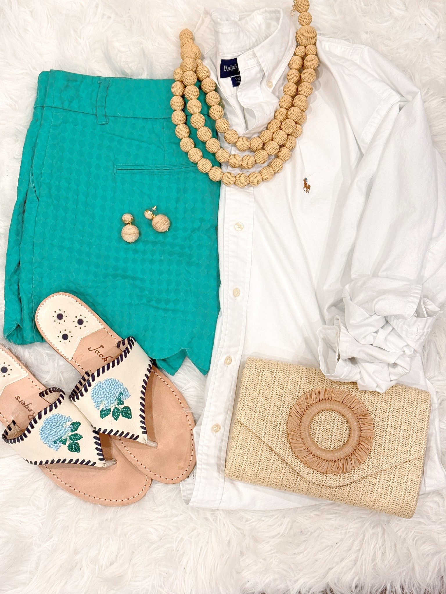 Classic, coastal, and effortlessly chic 💚🤍 This crisp white button-down paired with these gorgeous emerald scalloped shorts is giving timeless Southern style with a fun pop of color! I added my favorite statement beaded necklace, hydrangea sandals, and a woven clutch for the perfect polished spring-to-summer look. This is one of those outfits you can wear on repeat all season long!

Wearing size L

#LTKStyle #LTKSeasonal #LTKSummer #CoastalStyle #ClassicStyle

#LTKMidsize