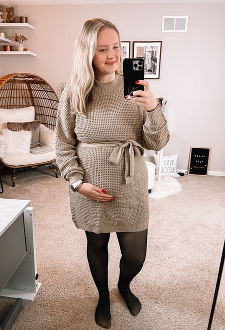 It’s a cozy waffle knit sweater dress in a neutral khaki color, size XL. While I have a slight baby bump I still think it runs quite small so definitely size up one or even two sizes if you’re hoping to achieve the desired look of the product page model.

Fleece lined tights are the BEST on Amazon, can’t recommend them enough!!

#LTKmidsize #LTKbump #LTKSeasonal