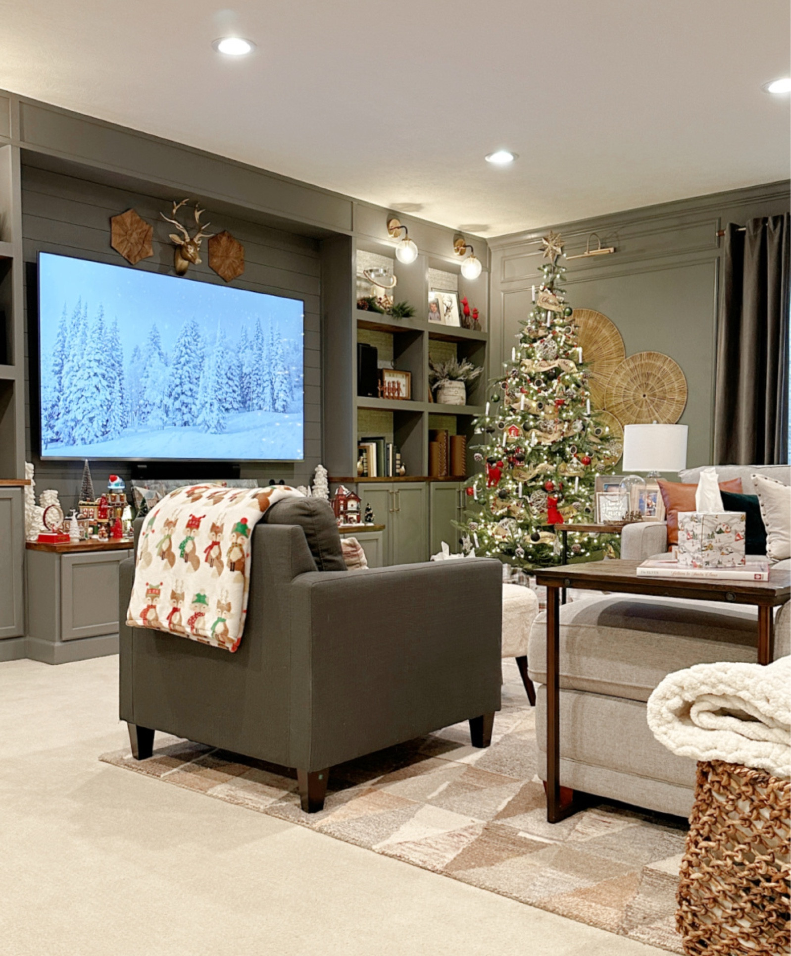 Our basement is where I have FUN with traditional Christmas colors in our decor. The Christmas village is displayed down here, along with our super festive tree. (The clip on candles are a favorite this year.)

Click this photo in my profile link to see the whole basement holiday tour! 😍😍


#LTKHoliday #LTKSeasonal #LTKhome