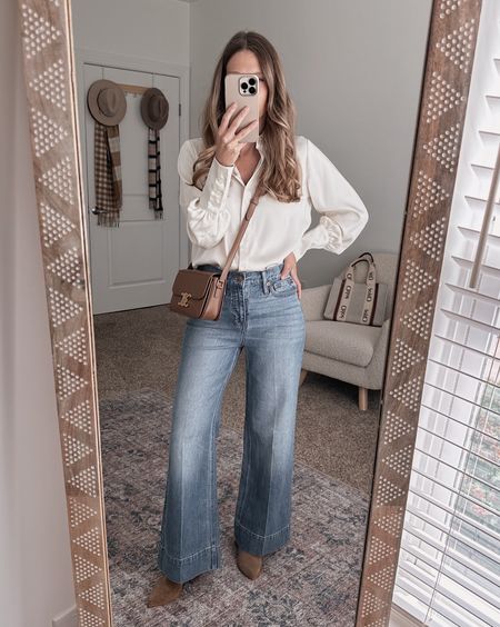 A silky button down top is a great hero piece to your outfit. Trouser denim jeans make this a perfect workwear outfit too. 

#LTKstyletip #LTKworkwear #LTKSeasonal