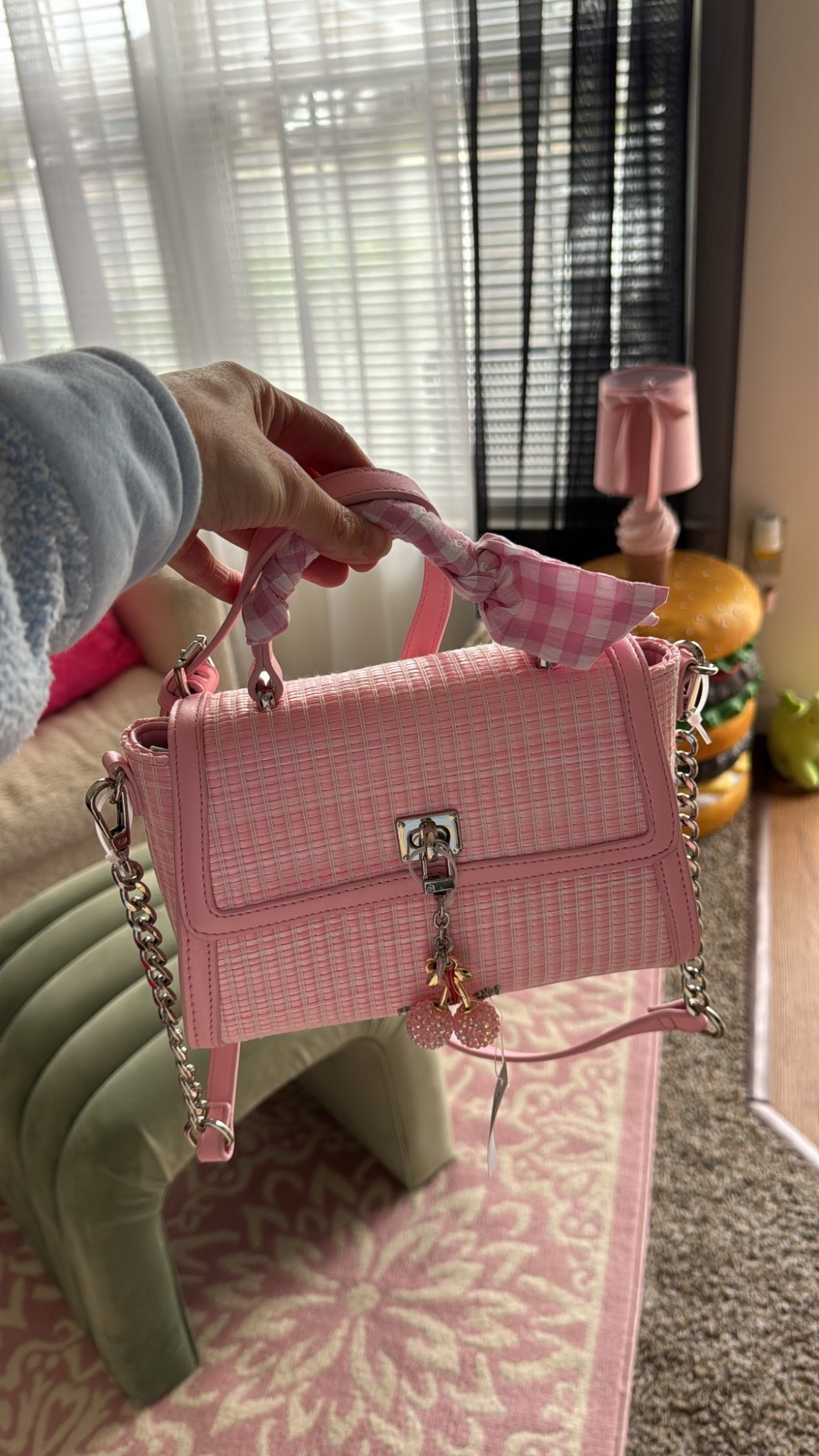 Pink straw purse with bow and charm 

#LTKHome #LTKSaleAlert