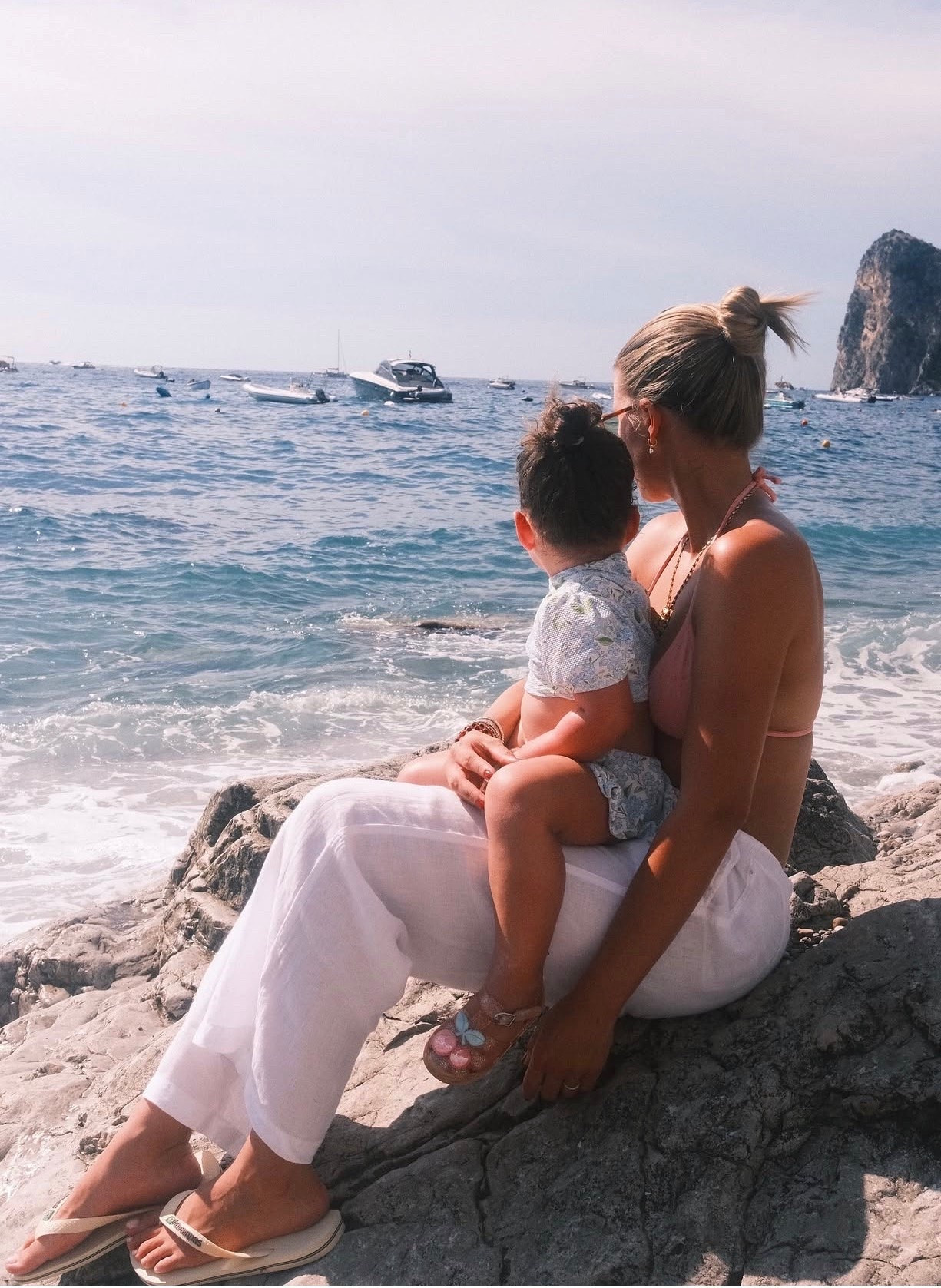 Sofia Richie Grainge's Brazil rubber flip-flops linen pants