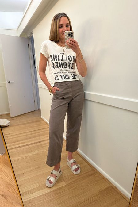 Weekday ootd! Urban outfitters Rolling Stones graphic tee, Spanx twill pant use code LSWXSPANX. Kohls summer sandals, summer outfit, travel outfit 

#LTKFindsUnder50 #LTKOver40 #LTKFindsUnder100