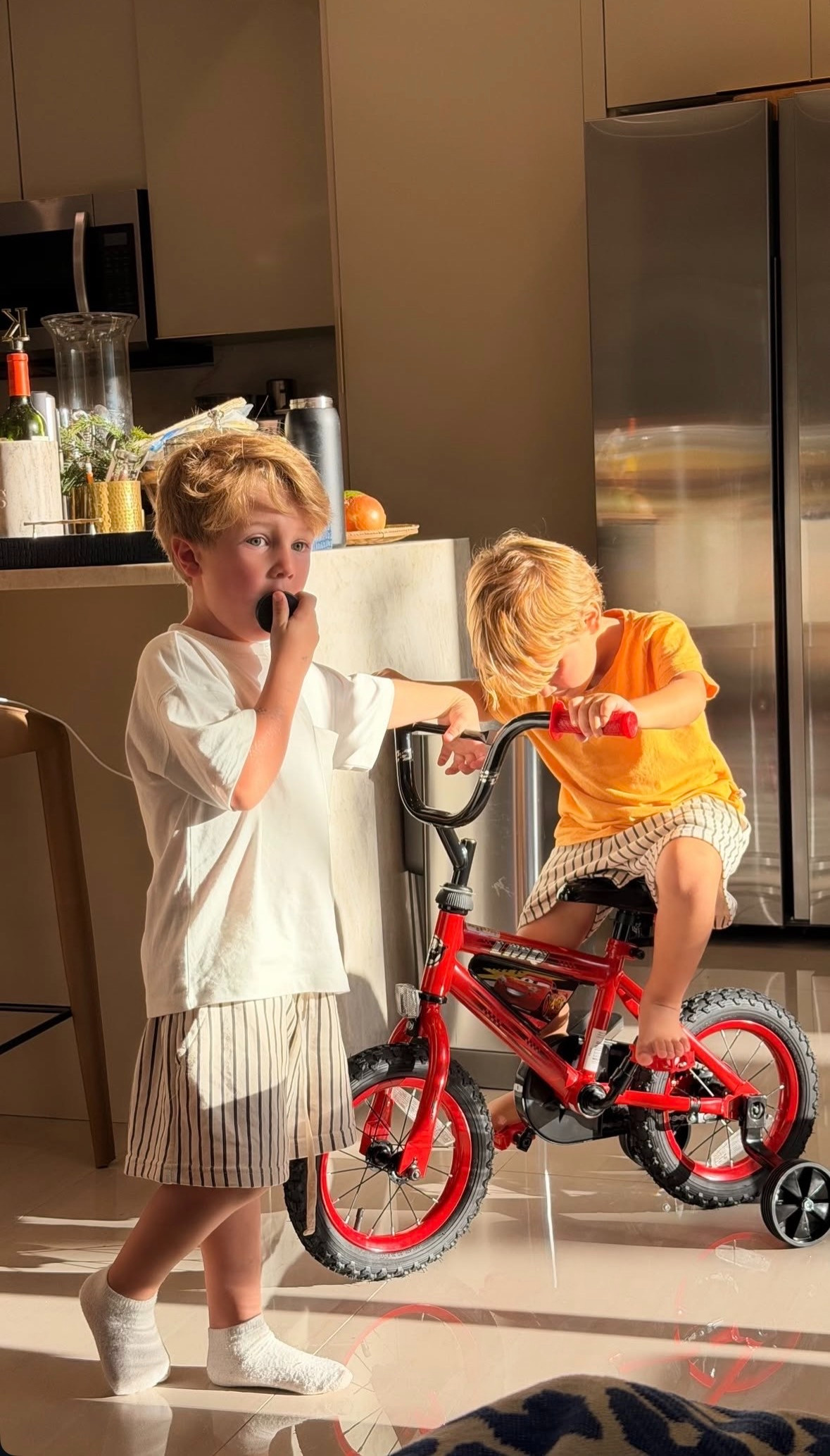 Indoor adventures and snack breaks. That’s the vibe 🚲🍪 

 #LTKootd #LTKmomlife #LTKKids