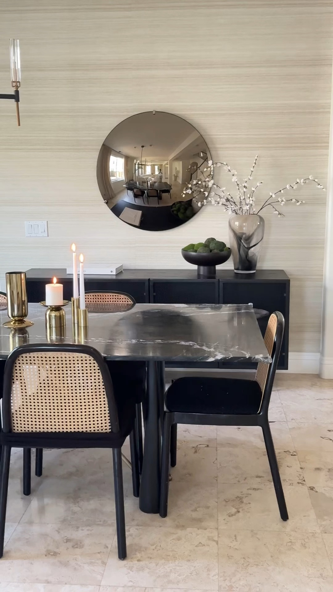 The dining room started out already looking great with the marble dining table and mesh buffet. We then elevated it with the concave mirror and of course the wallpaper.💫

#diningroomdesign #diningroomgoals #cb2 #phillipjeffrieswallcovering #phillipjeffries

#LTKHome